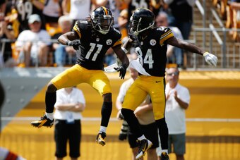 PITTSBURGH, PA - SEPTEMBER 7:  Markus Wheaton #11 of the Pittsburgh Steelers celebrates with Antonio Brown #84 after picking up a first down during the first quarter against the Cleveland Browns at Heinz Field on September 7, 2014 in Pittsburgh, Pennsylva