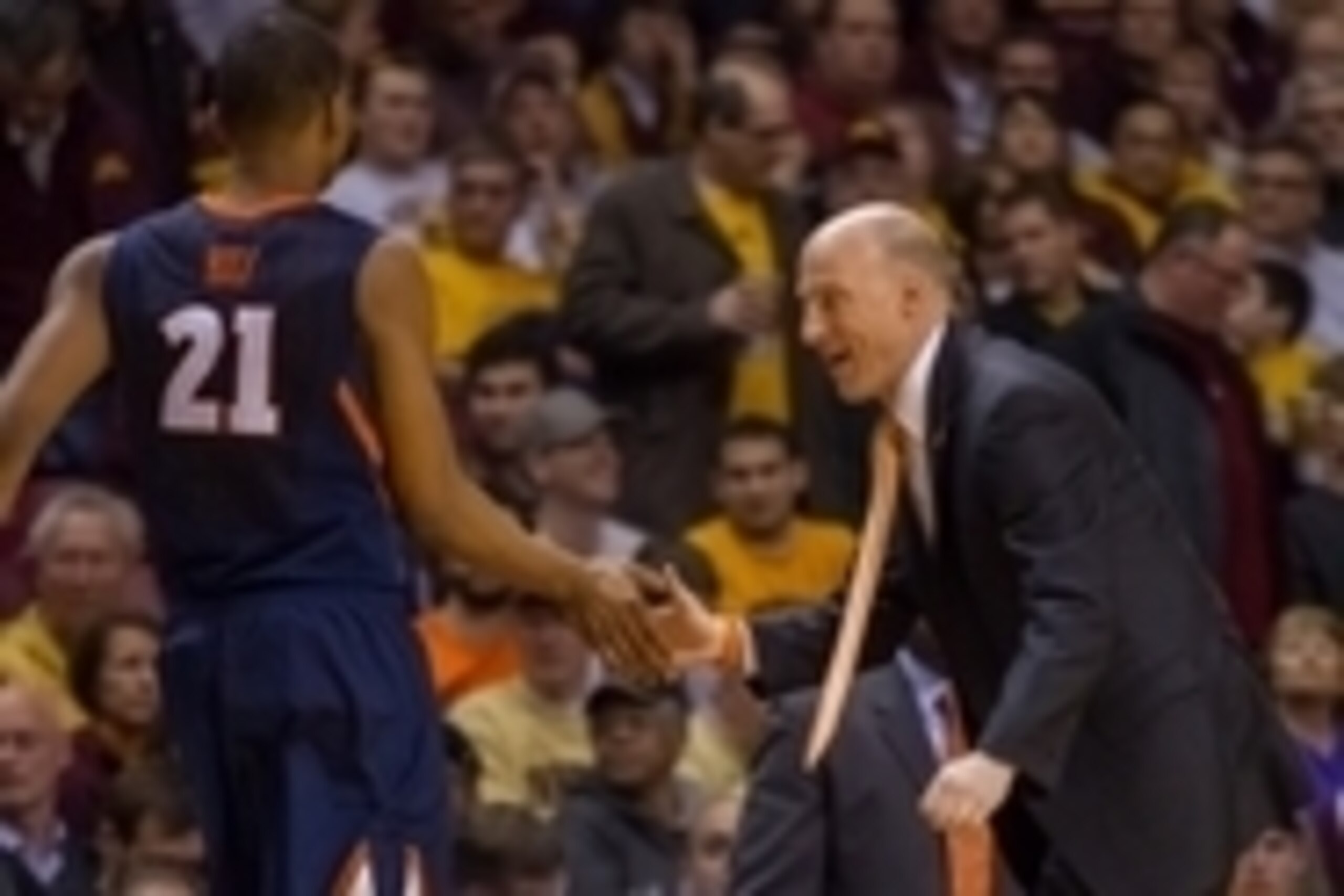 Feb 19, 2014; Minneapolis, MN, USA; Illinois Fighting Illini head coach John Groce congratulates guard Malcolm Hill (21) in the second half against the Minnesota Gophers at Williams Arena. Illinois wins 62-49. Mandatory Credit: Brad Rempel-USA TODAY Sport