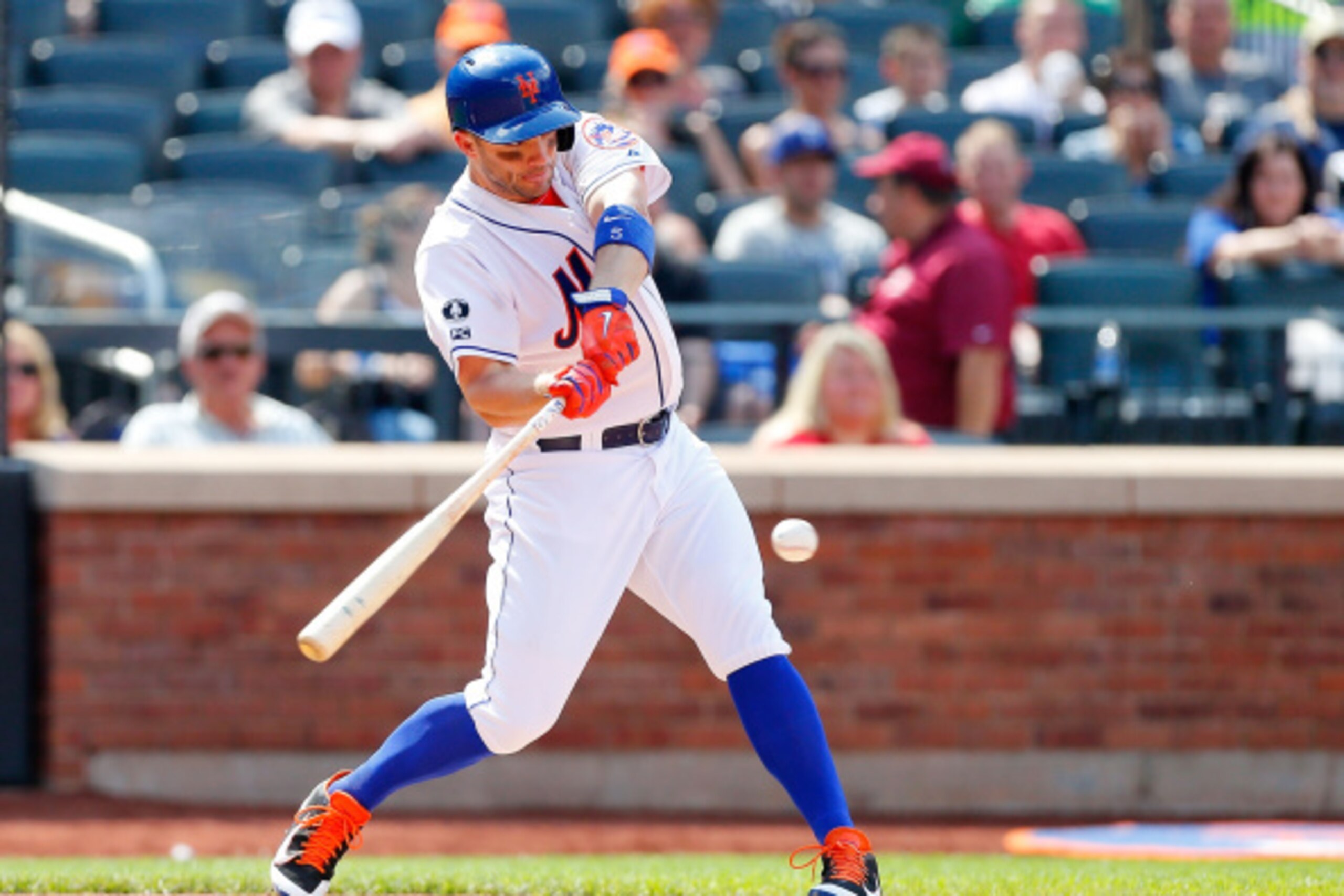NEW YORK, NY - AUGUST 31:  David Wright #5 of the New York Mets connects on a fifth inning RBI base hit against the Philadelphia Phillies at Citi Field on August 31, 2014 in the Flushing neighborhood of the Queens borough of New York City.  (Photo by Jim 
