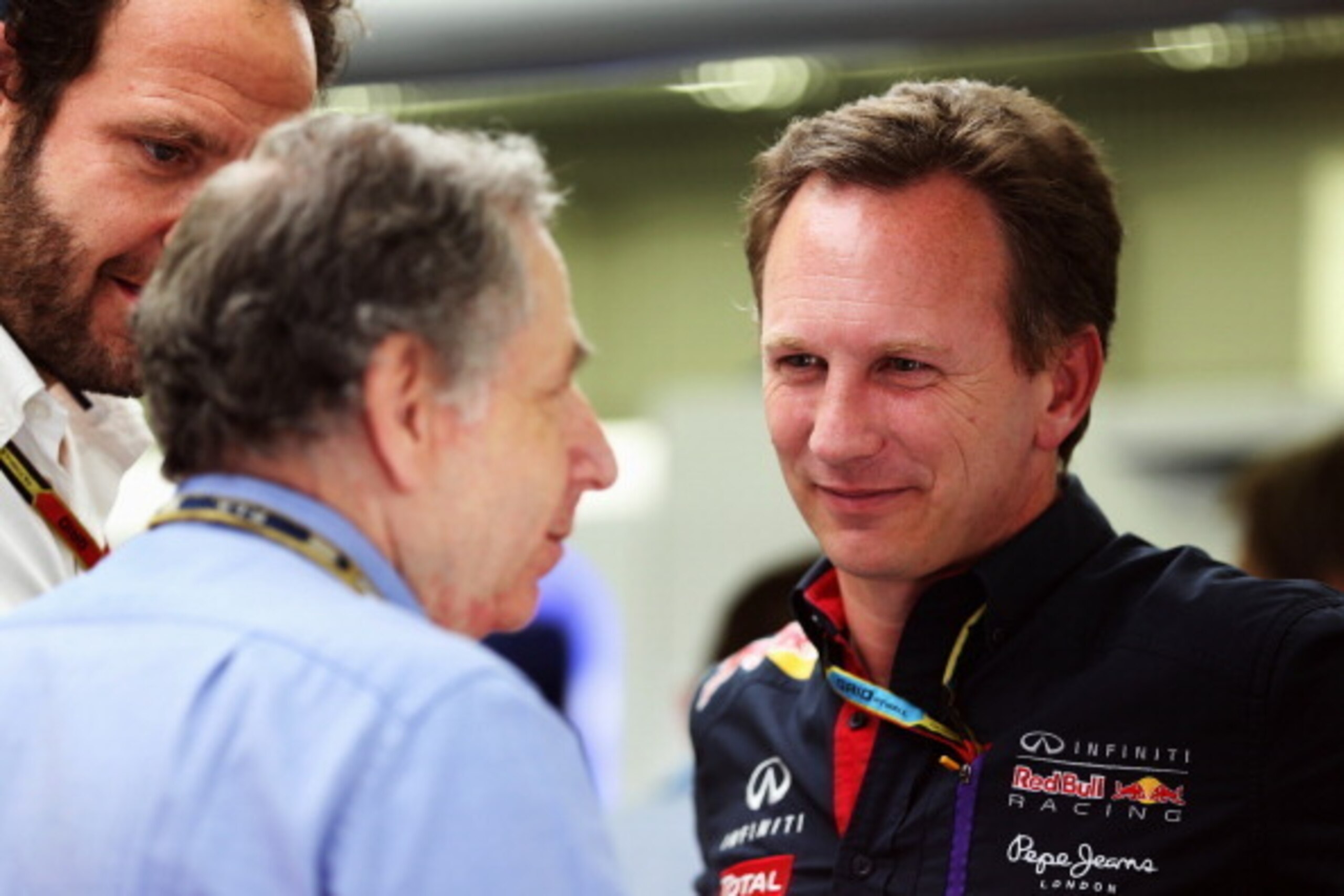 SAKHIR, BAHRAIN - APRIL 05:  F.I.A. President Jean Todt (L) talks with Infiniti Red Bull Racing Team Principal Christian Horner (R) during the final practice session prior to qualifying for the Bahrain Formula One Grand Prix at the Bahrain International C