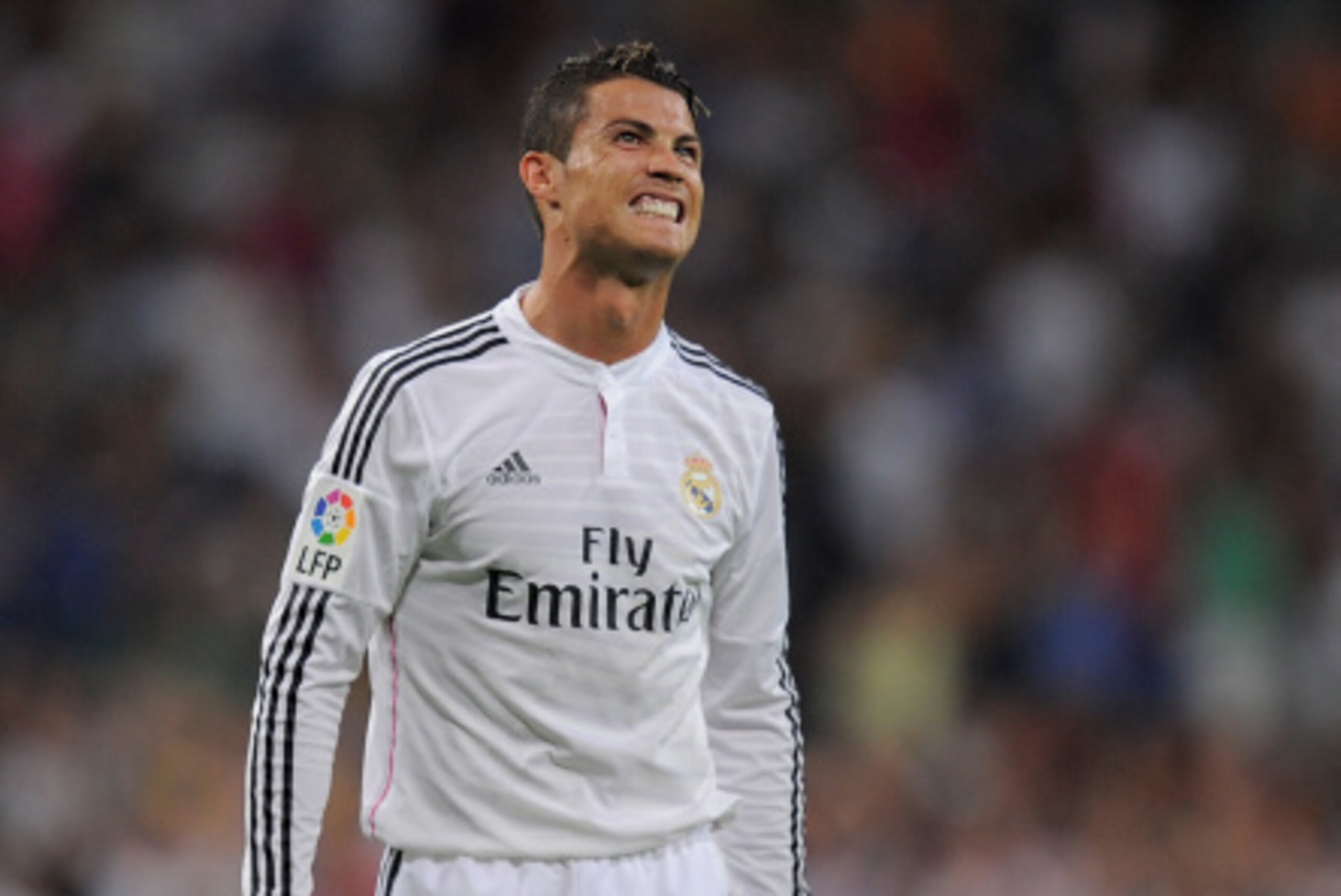MADRID, SPAIN - AUGUST 25:  Cristiano Ronaldo of Real Madrid celebrates after scoring Real's 2nd goal during the La liga match between Real Madrid CF and Cordoba CF at Estadio Santiago Bernabeu on August 25, 2014 in Madrid, Spain.  (Photo by Denis Doyle/G