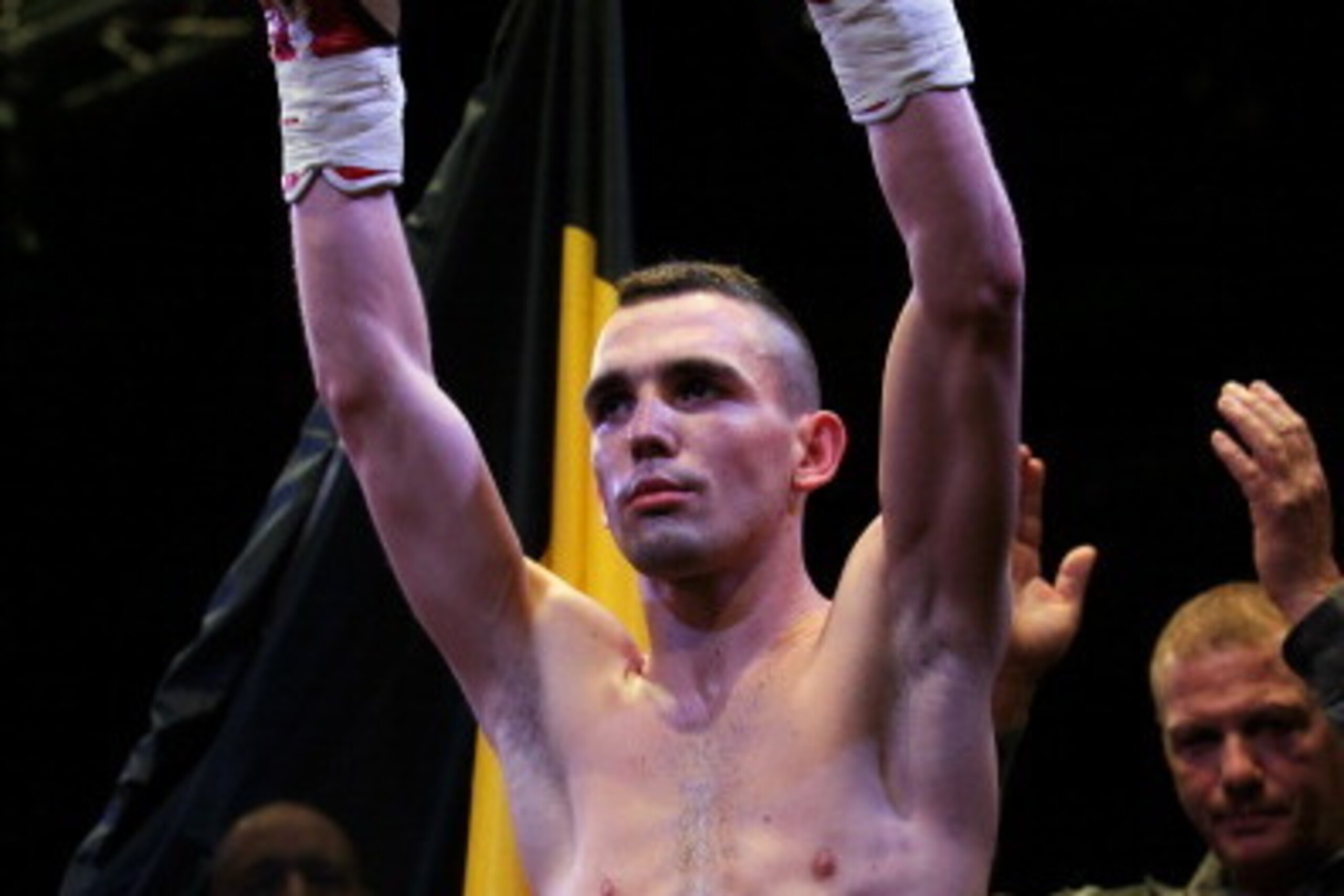 LIEGE, BELGIUM - DECEMBER 14:  Stephane Jamoye of Belgium raises his arms for the fans prior to his bout against Lee Haskins of England in their European Boxing Union Bantamweight Title Fight at the Ville de Herstal on December 14, 2012 in Liege, Belgium.