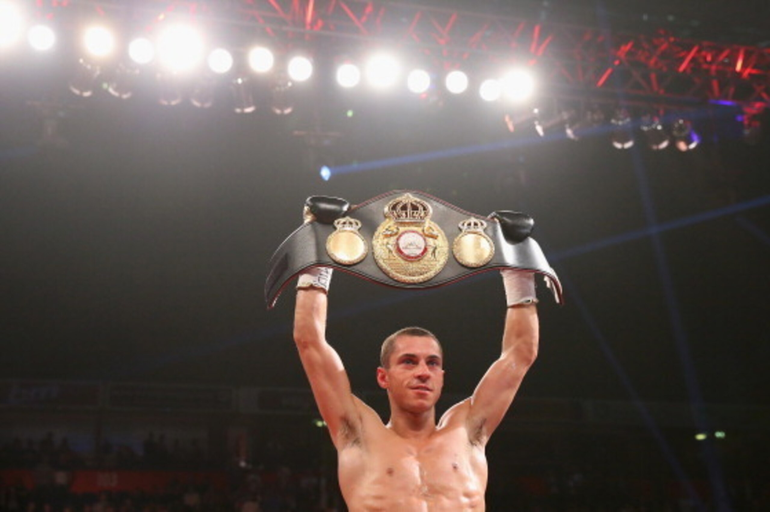 MANCHESTER, ENGLAND - APRIL 19:  Scott Quigg celebrates victory over Tshifhiwa Munyai after the WBA World Super Bantamweight Title fight between Scott Quigg and Tshifhiwa Munyai at MEN Arena on April 19, 2014 in Manchester, England.  (Photo by Alex Livese
