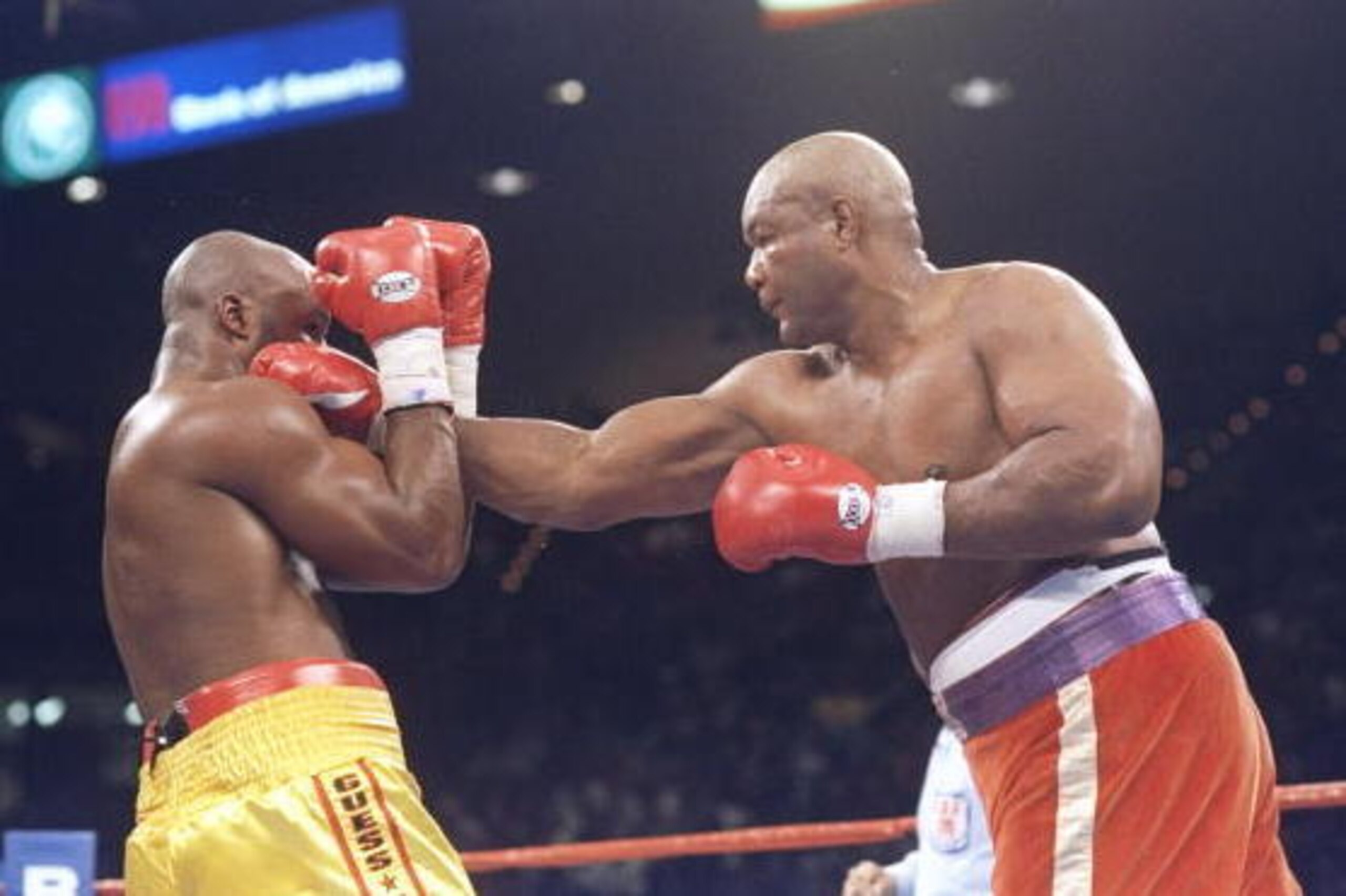 5 Nov 1994:  George Foreman lands a straight right on Michael Moorer during a bout in Las Vegas, Nevada.  Foreman won the fight with a knockout in the tenth round. Mandatory Credit: Holly Stein  /Allsport