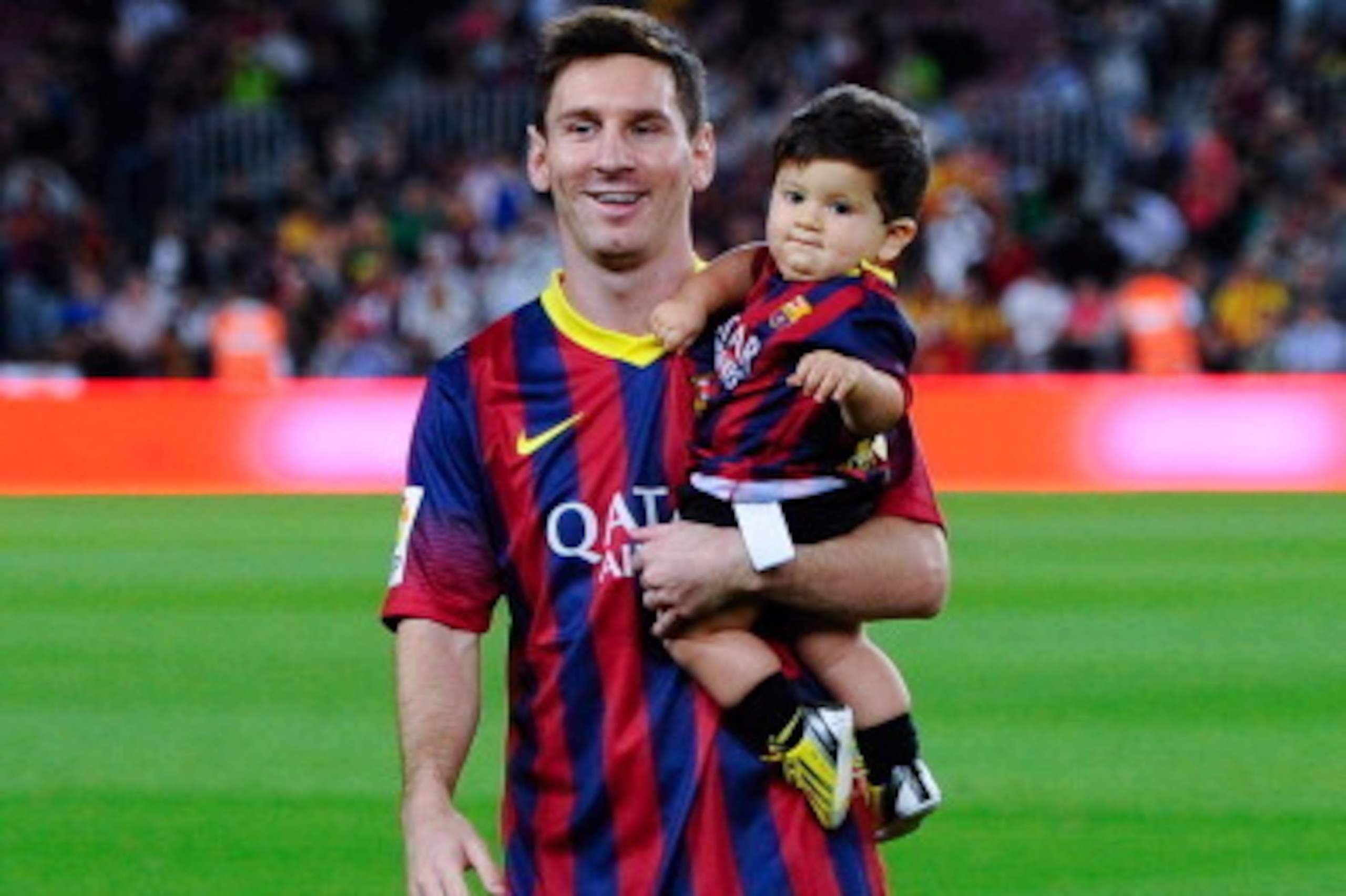 BARCELONA, SPAIN - SEPTEMBER 24: Lionel Messi of FC Barcelona with his son Thiago walk out the pitch prior to the La Liga match between FC Barcelona and Real Sociedad de Futbol at Camp Nou on September 24, 2013 in Barcelona, Spain. (Photo by David Ramo BARCELONA, SPAIN - SEPTEMBER 24: Lionel Messi of FC Barcelona with his son Thiago walk out the pitch prior to the La Liga match between FC Barcelona and Real Sociedad de Futbol at Camp Nou on September 24, 2013 in Barcelona, Spain. (Photo by David Ramo