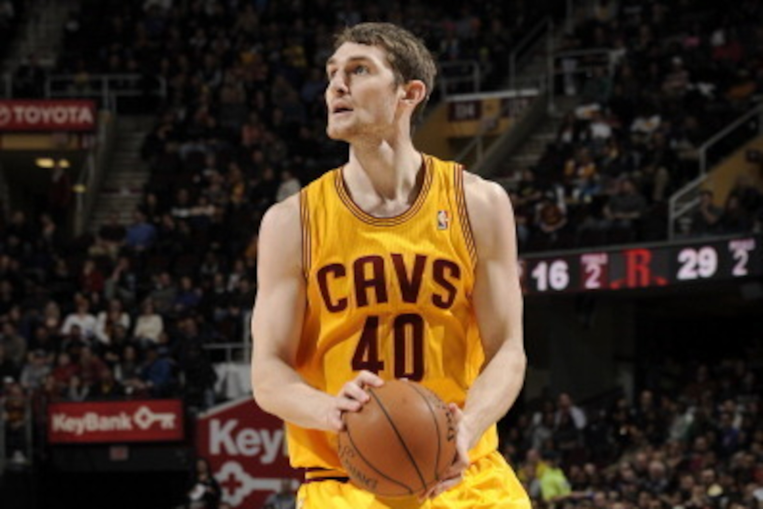 CLEVELAND, OH - MARCH 22:  Tyler Zeller #40 of the Cleveland Cavaliers handles the ball against the Houston Rockets at The Quicken Loans Arena on March 22, 2014 in Cleveland, Ohio. NOTE TO USER: User expressly acknowledges and agrees that, by downloading