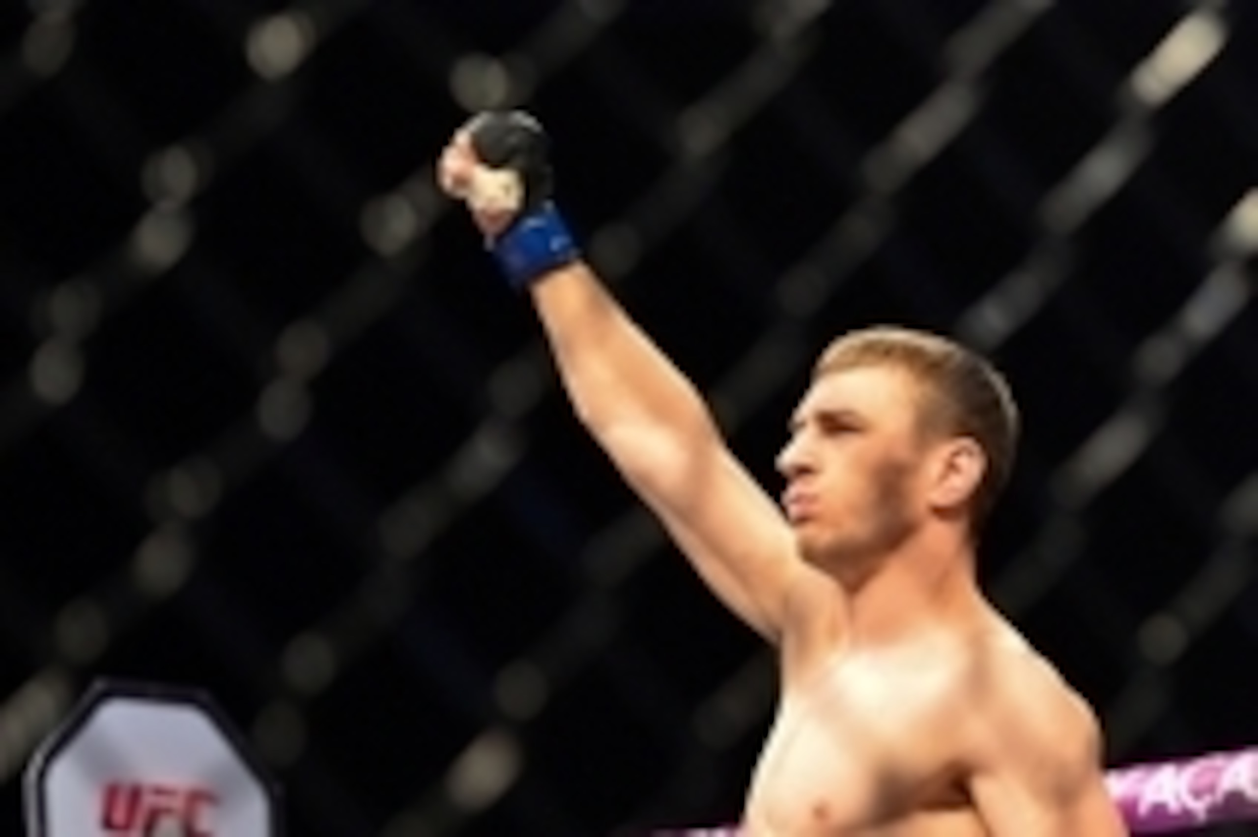 Sep 4, 2013; Belo Horizonte, BRAZIL;  Piotr Hallmann (white shorts) reacts during his fight against Francisco Massaranduba Trinaldo (not pictured) UFC Fight Night at Mineirinho Arena. Mandatory Credit: Jason Silva-USA TODAY Sports