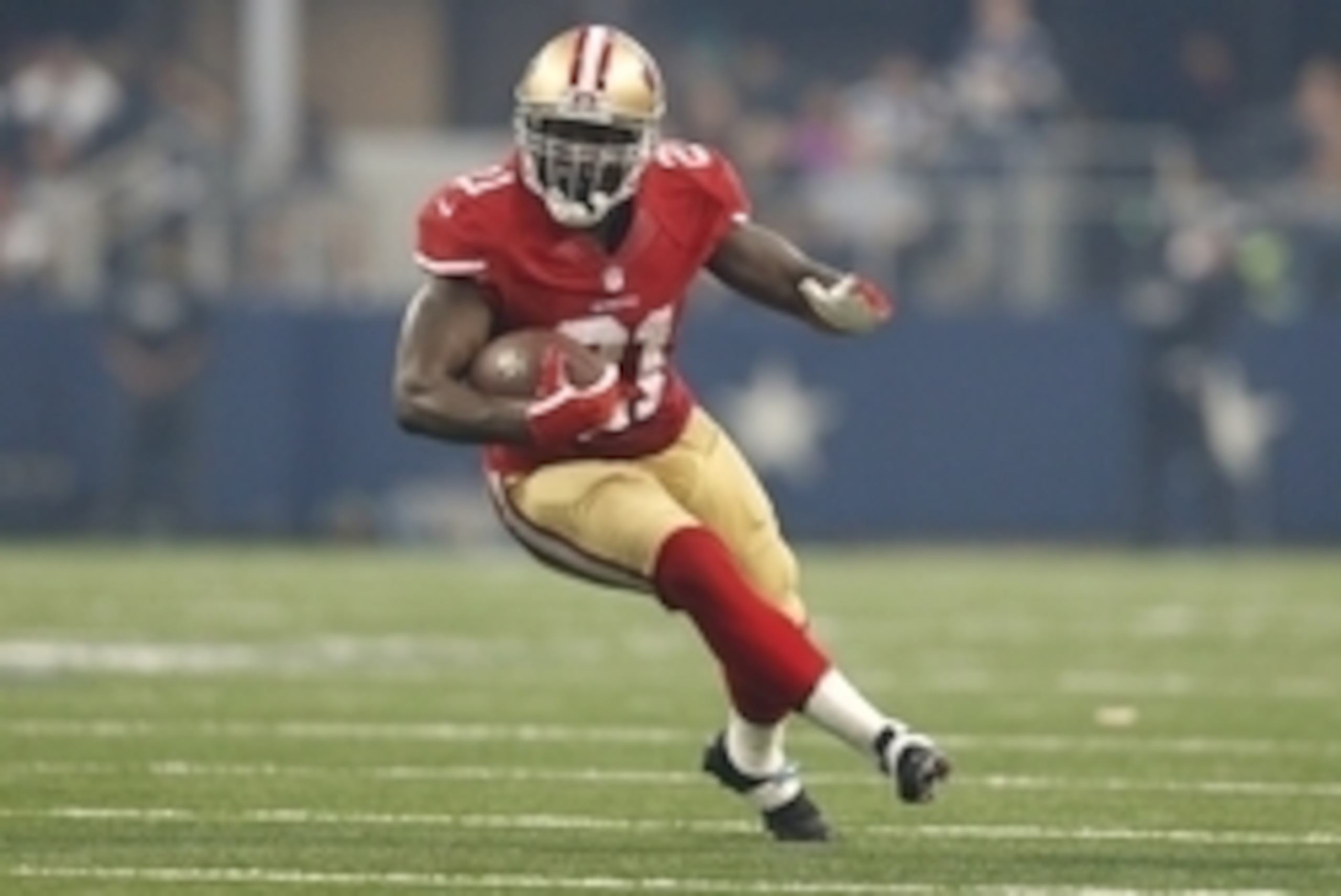 Sep 7, 2014; Arlington, TX, USA; San Francisco 49ers running back Frank Gore (21) runs with the ball against the Dallas Cowboys at AT&T Stadium. Mandatory Credit: Matthew Emmons-USA TODAY Sports
