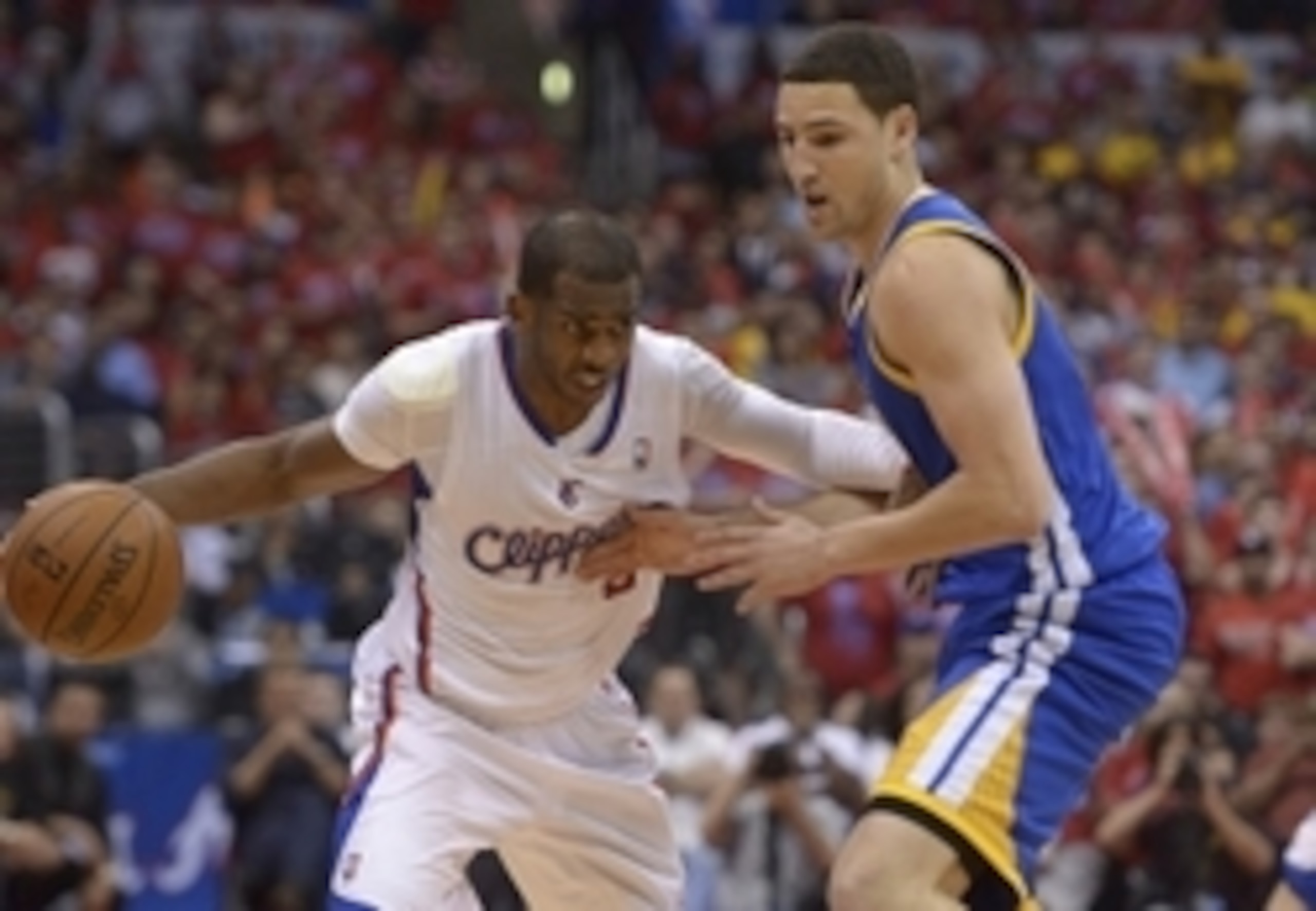 May 3, 2014; Los Angeles, CA, USA; Los Angeles Clippers guard Chris Paul (3) is defended by Golden State Warriors guard Klay Thompson (11) in game seven of the first round of the 2014 NBA Playoffs at Staples Center. The Clippers defeated the Warriors 126-