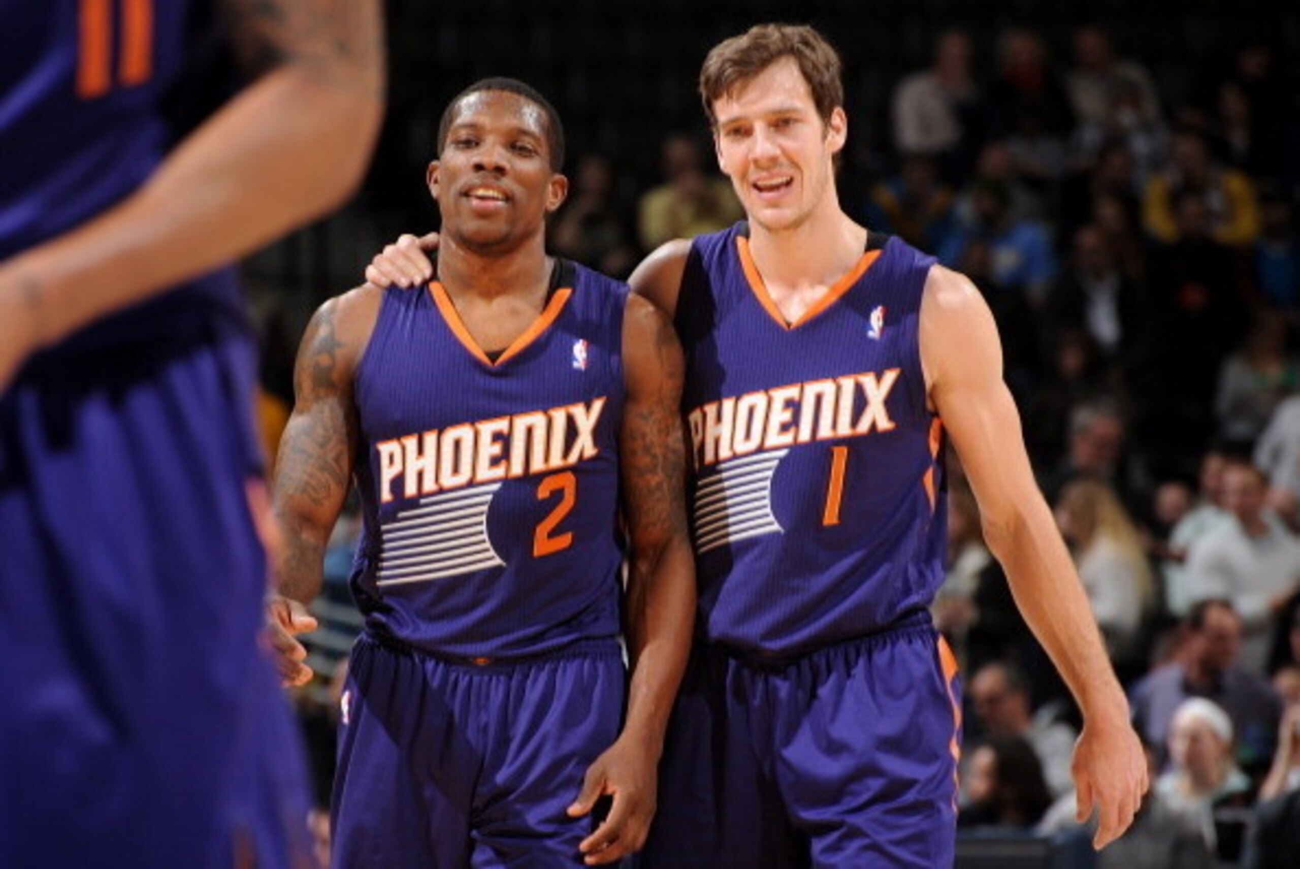 DENVER, CO - December 20:  Eric Bledsoe #2 and Goran Dragic #1 of the Phoenix Suns smile and walk off the court against the Denver Nuggets on December 20, 2013 at the Pepsi Center in Denver, Colorado. NOTE TO USER: User expressly acknowledges and agrees t