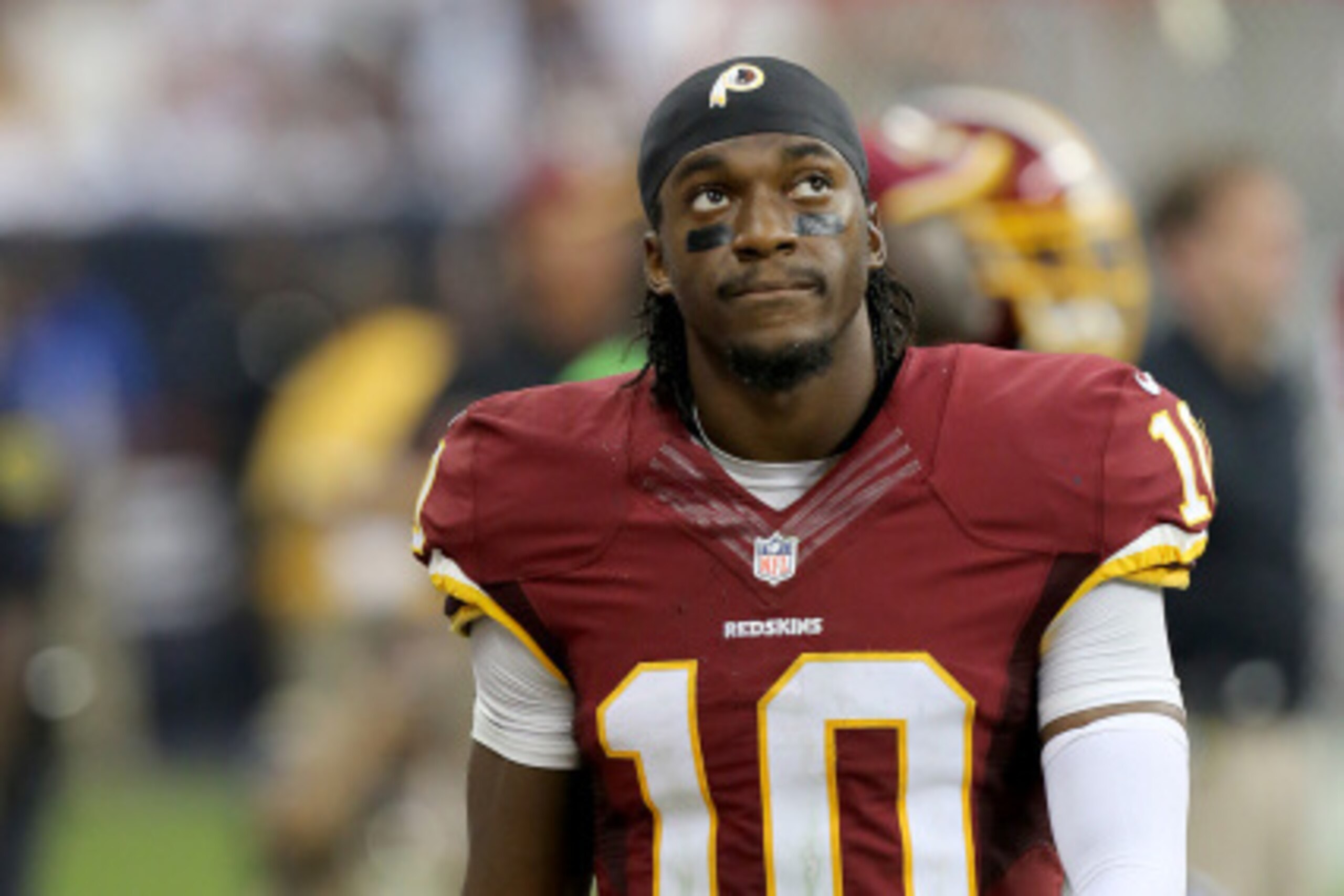 HOUSTON, TX- SEPTEMBER 07: Washington Redskins quarterback Robert Griffin #10 III looks up at the scoreboard while playing against the Houston Texans on September 7, 2014 at NRG Stadium in Houston, Texas. (Photo by Thomas B. Shea/Getty Images)