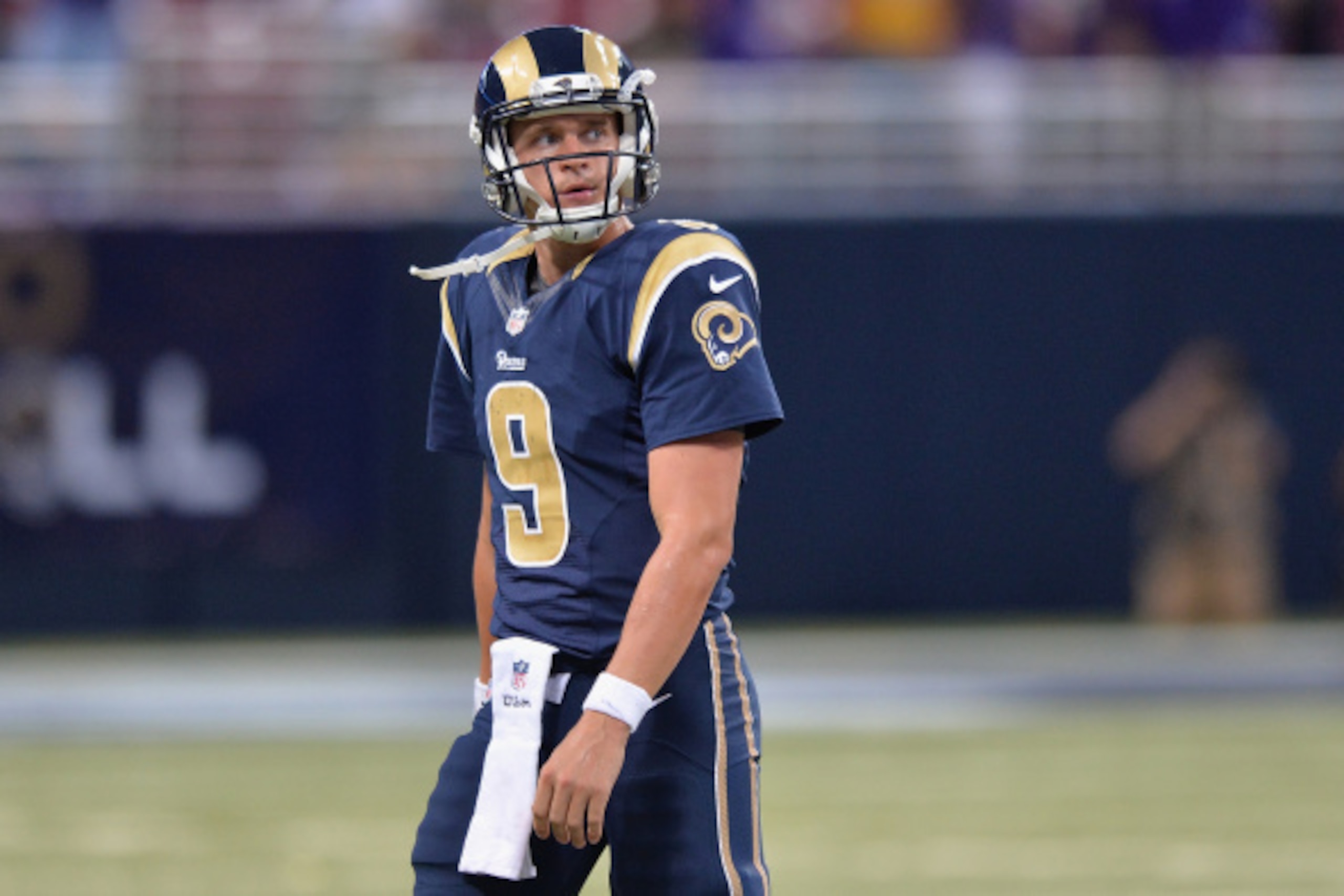 ST. LOUIS, MO - SEPTEMBER 7:  Austin Davis #9 of the St. Louis Rams reacts to throwing a fourth quarter interception returned for a touchdown at the Edward Jones Dome on September 7, 2014 in St. Louis, Missouri. The Vikings defeated the Rams 34-6.  (Photo