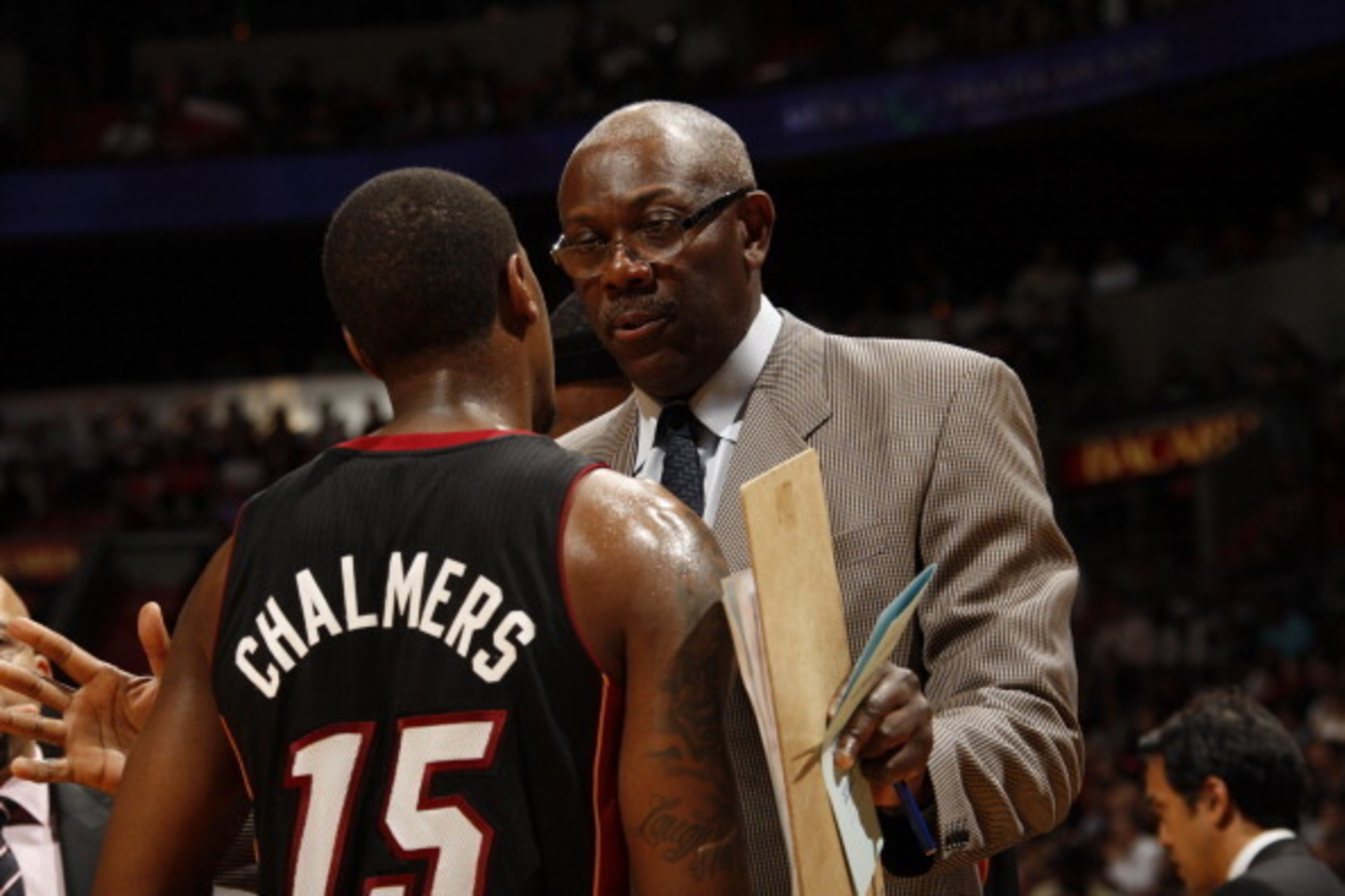 MIAMI, FL - MARCH 20: Assistant coach Bob McAdoo talks with Mario Chalmers #15 of the Miami Heat during the game against the Phoenix Suns on March 20, 2012 at American Airlines Arena in Miami, Florida. NOTE TO USER: User expressly acknowledges and agrees MIAMI, FL - MARCH 20: Assistant coach Bob McAdoo talks with Mario Chalmers #15 of the Miami Heat during the game against the Phoenix Suns on March 20, 2012 at American Airlines Arena in Miami, Florida. NOTE TO USER: User expressly acknowledges and agrees