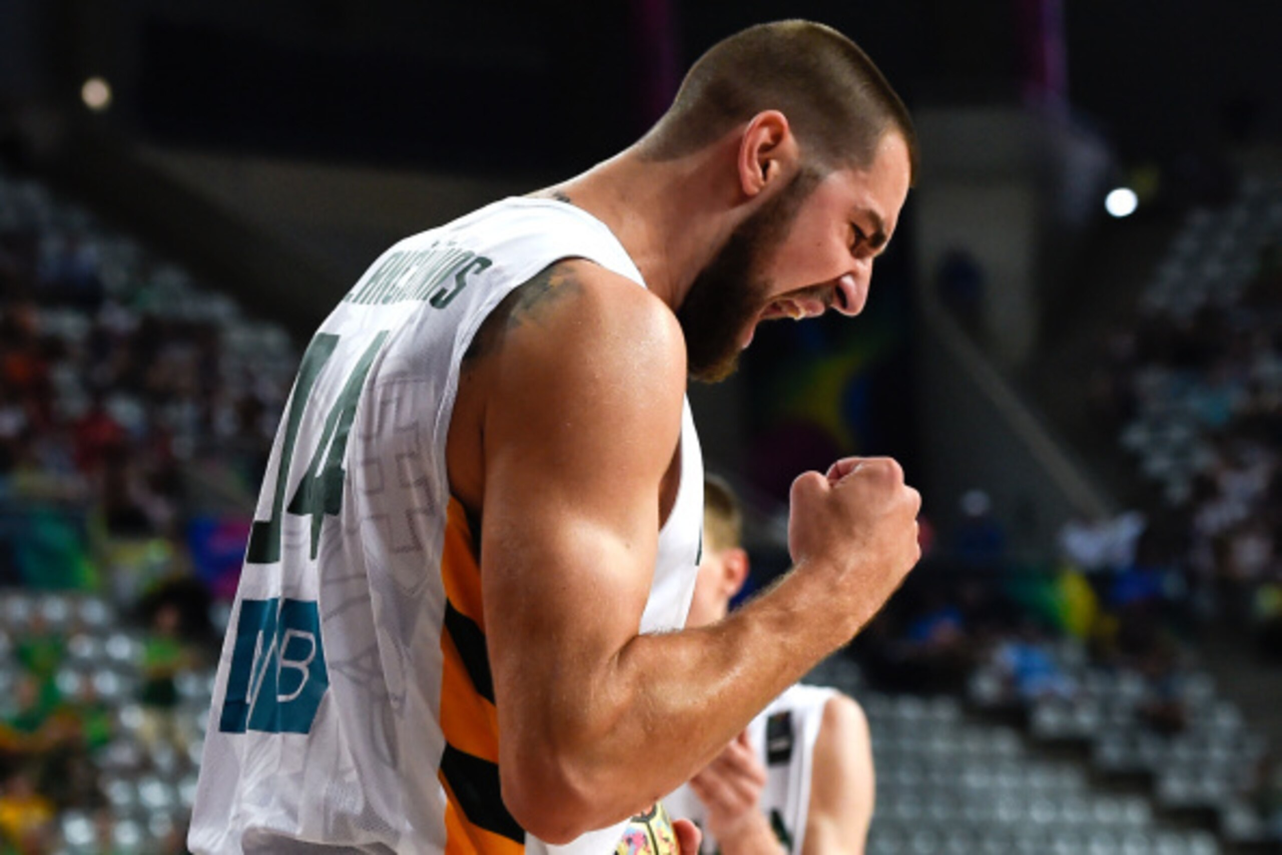BARCELONA, SPAIN - SEPTEMBER 09:  Jonas Valanciunas #14 of the Lithuania Basketball Men's National Team reacts during 2014 FIBA Basketball World Cup quarter-final match between Lithuania and Turkey at Palau Sant Jordi on September 9, 2014 in Barcelona, Sp