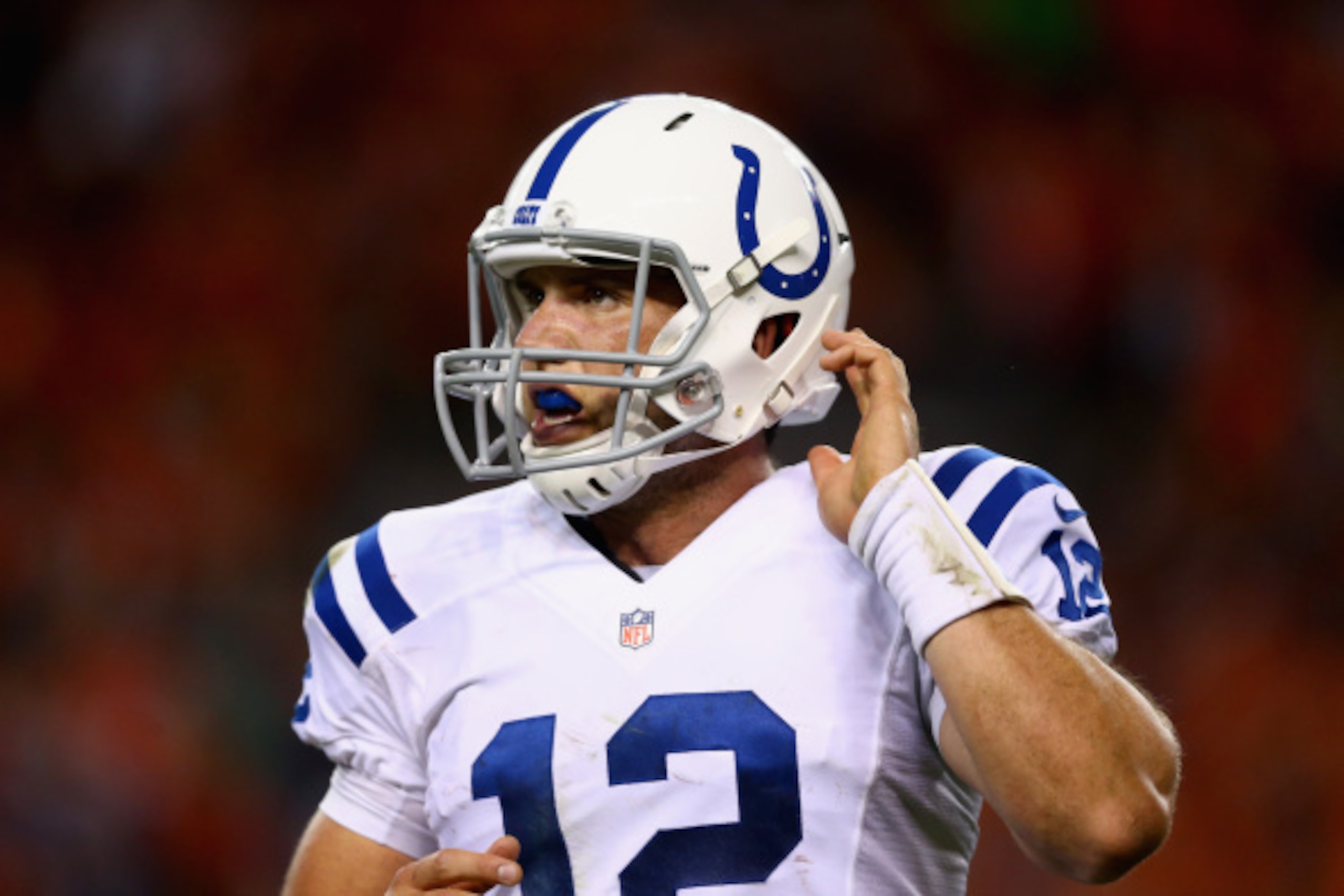 DENVER, CO - SEPTEMBER 07:  Quarterback Andrew Luck #12 of the Indianapolis Colts looks on against the Denver Broncos at Sports Authority Field at Mile High on September 7, 2014 in Denver, Colorado.  (Photo by Jeff Gross/Getty Images)