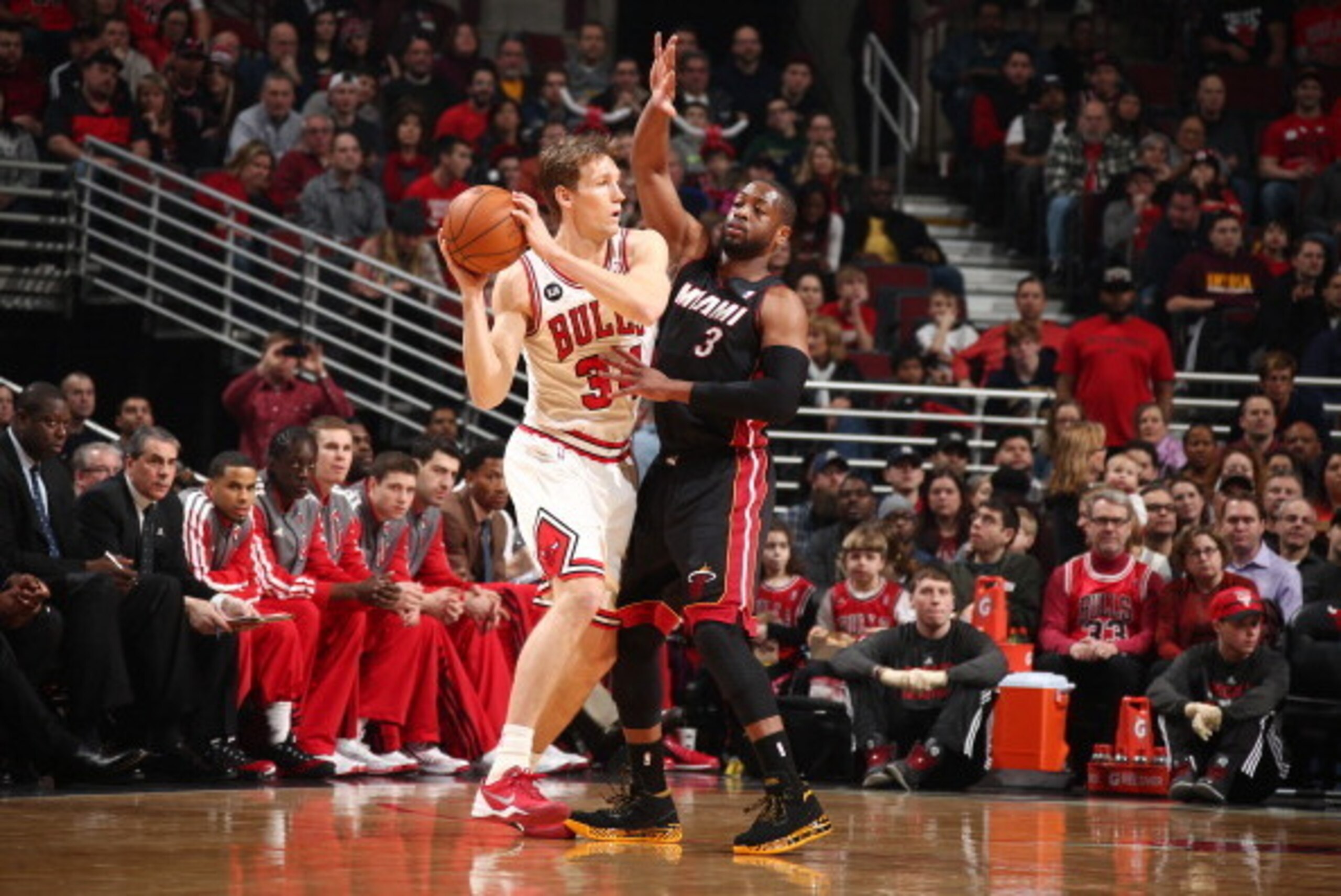CHICAGO, IL - MARCH 9: Dwyane Wade #3 of the Miami Heat defends Mike Dunleavy #34 of the Chicago Bulls during a game at the United Center in Chicago. NOTE TO USER: User expressly acknowledges and agrees that, by downloading and or using this photograph, U CHICAGO, IL - MARCH 9: Dwyane Wade #3 of the Miami Heat defends Mike Dunleavy #34 of the Chicago Bulls during a game at the United Center in Chicago. NOTE TO USER: User expressly acknowledges and agrees that, by downloading and or using this photograph, U