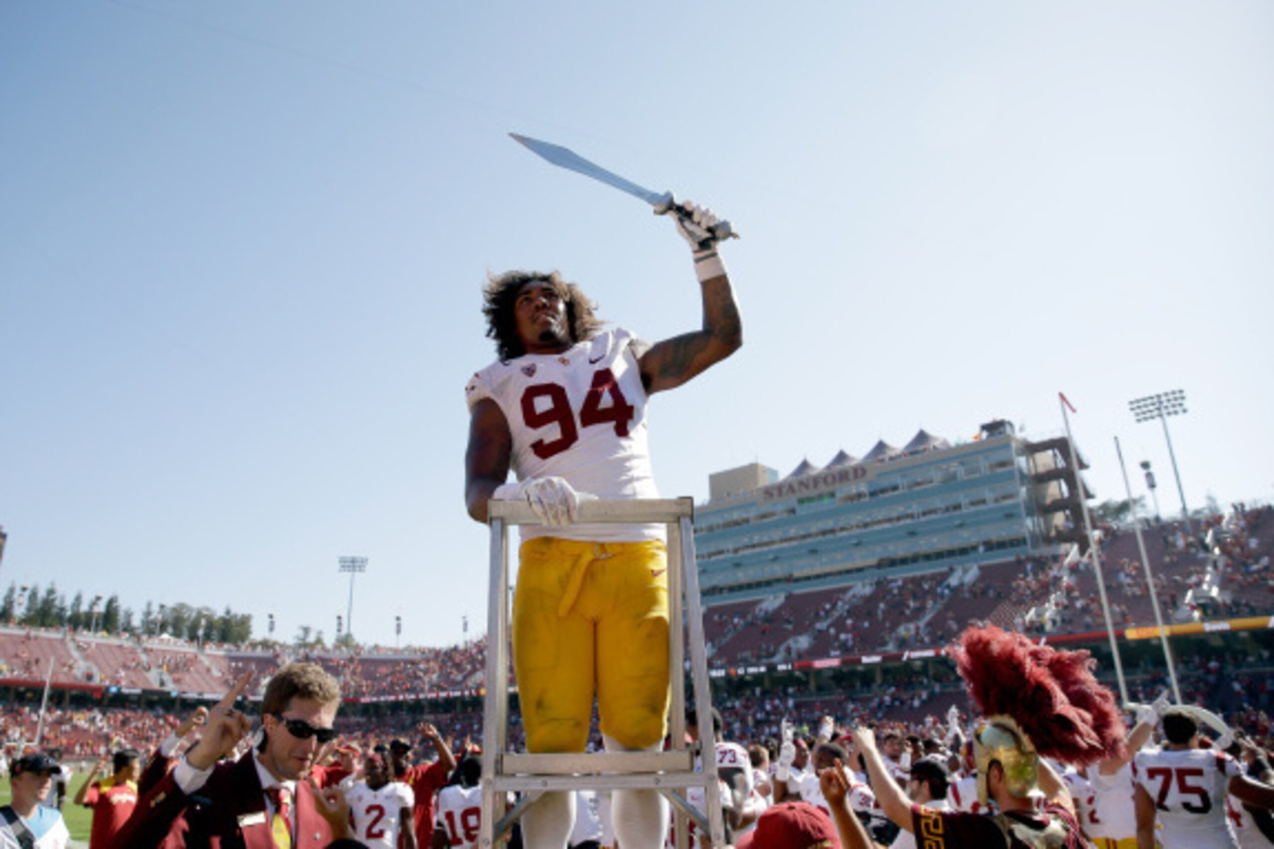 PALO ALTO, CA - SEPTEMBER 06: Leonard Williams #94 of the USC Trojans leads the USC marching band after they beat the Stanford Cardinal at Stanford Stadium on September 6, 2014 in Palo Alto, California. (Photo by Ezra Shaw/Getty Images) PALO ALTO, CA - SEPTEMBER 06: Leonard Williams #94 of the USC Trojans leads the USC marching band after they beat the Stanford Cardinal at Stanford Stadium on September 6, 2014 in Palo Alto, California. (Photo by Ezra Shaw/Getty Images)