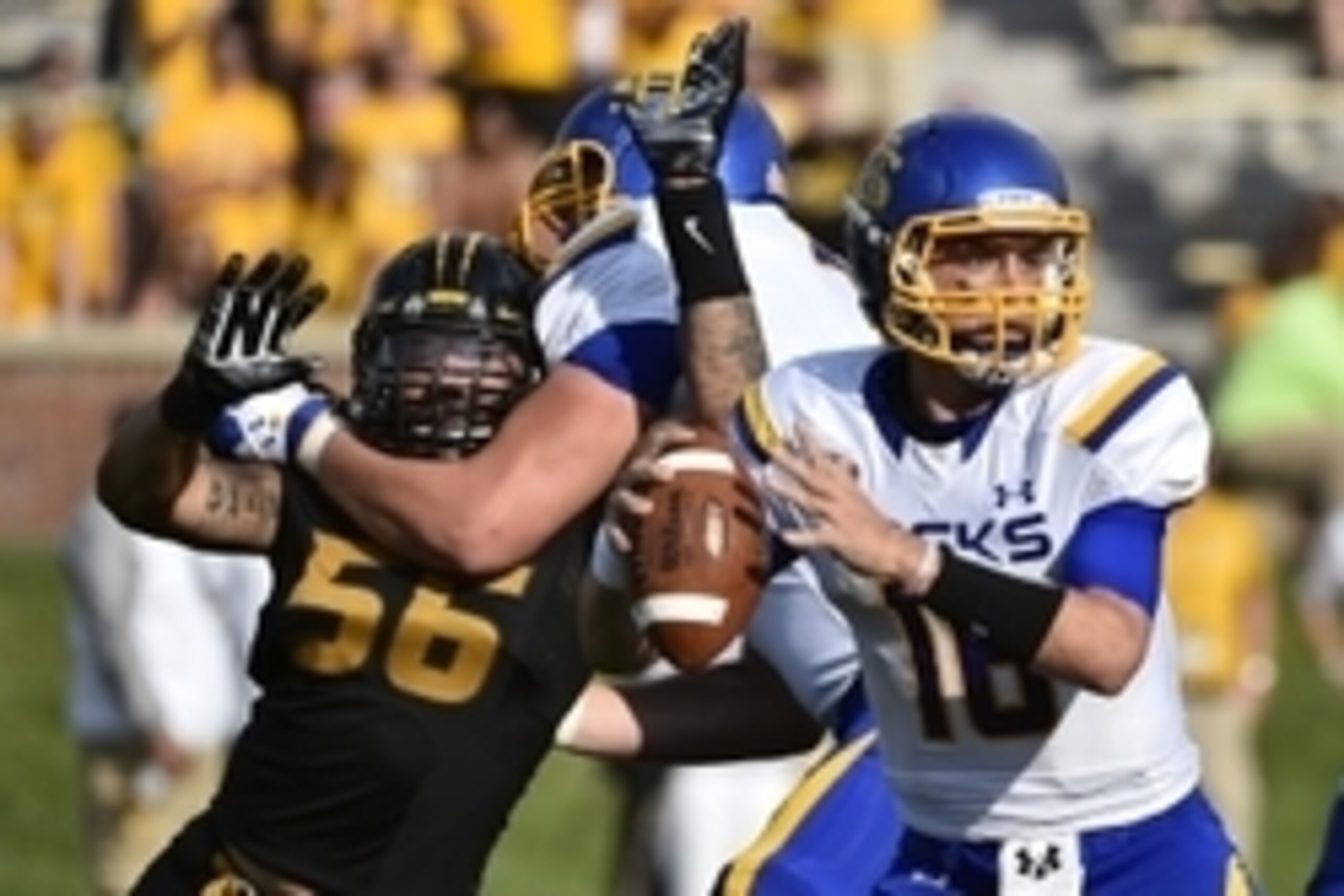 Aug 30, 2014; Columbia, MO, USA; South Dakota State Jackrabbits quarterback Jacob Menage (16) attempts a pass under pressure from Missouri Tigers defensive lineman Shane Ray (56) during the second half at Faurot Field. Mandatory Credit: Jasen Vinlove-USA Aug 30, 2014; Columbia, MO, USA; South Dakota State Jackrabbits quarterback Jacob Menage (16) attempts a pass under pressure from Missouri Tigers defensive lineman Shane Ray (56) during the second half at Faurot Field. Mandatory Credit: Jasen Vinlove-USA