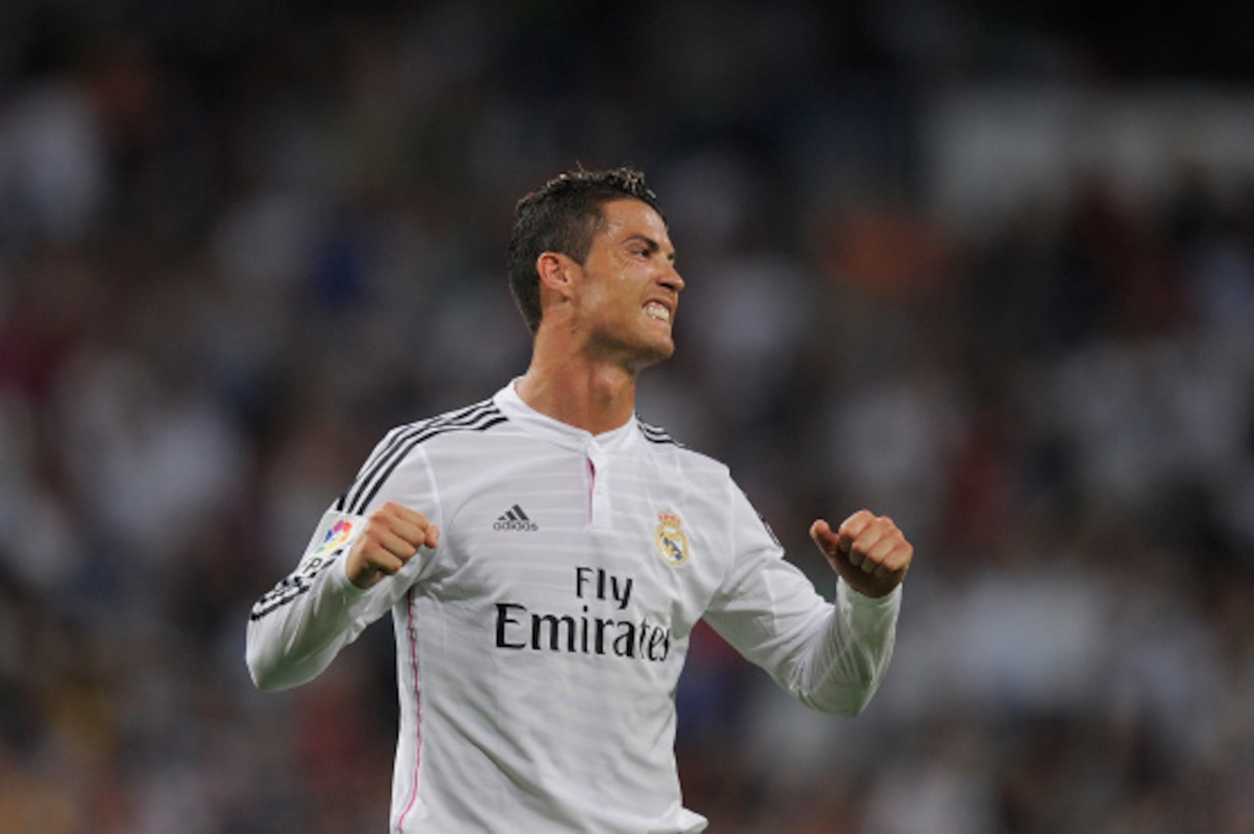 MADRID, SPAIN - AUGUST 25:  Cristiano Ronaldo of Real Madrid celebrates after scoring Real's 2nd goal during the La liga match between Real Madrid CF and Cordoba CF at Estadio Santiago Bernabeu on August 25, 2014 in Madrid, Spain.  (Photo by Denis Doyle/G