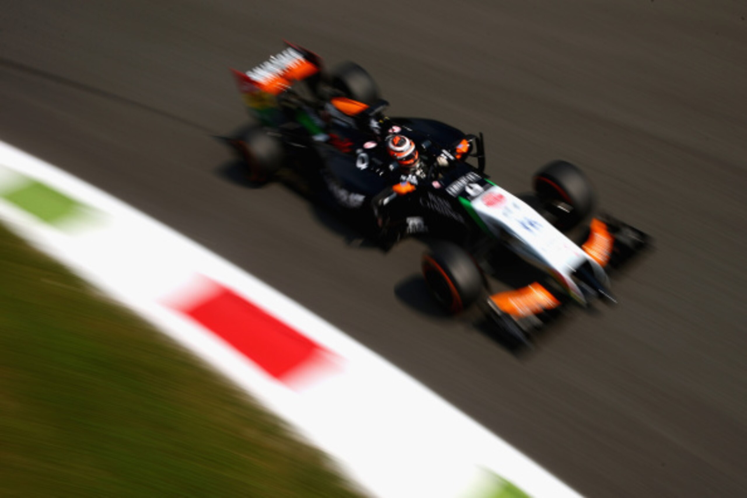 MONZA, ITALY - SEPTEMBER 05:  Nico Hulkenberg of Germany and Force India drives during Practice ahead of the F1 Grand Prix of Italy at Autodromo di Monza on September 5, 2014 in Monza, Italy.  (Photo by Paul Gilham/Getty Images)