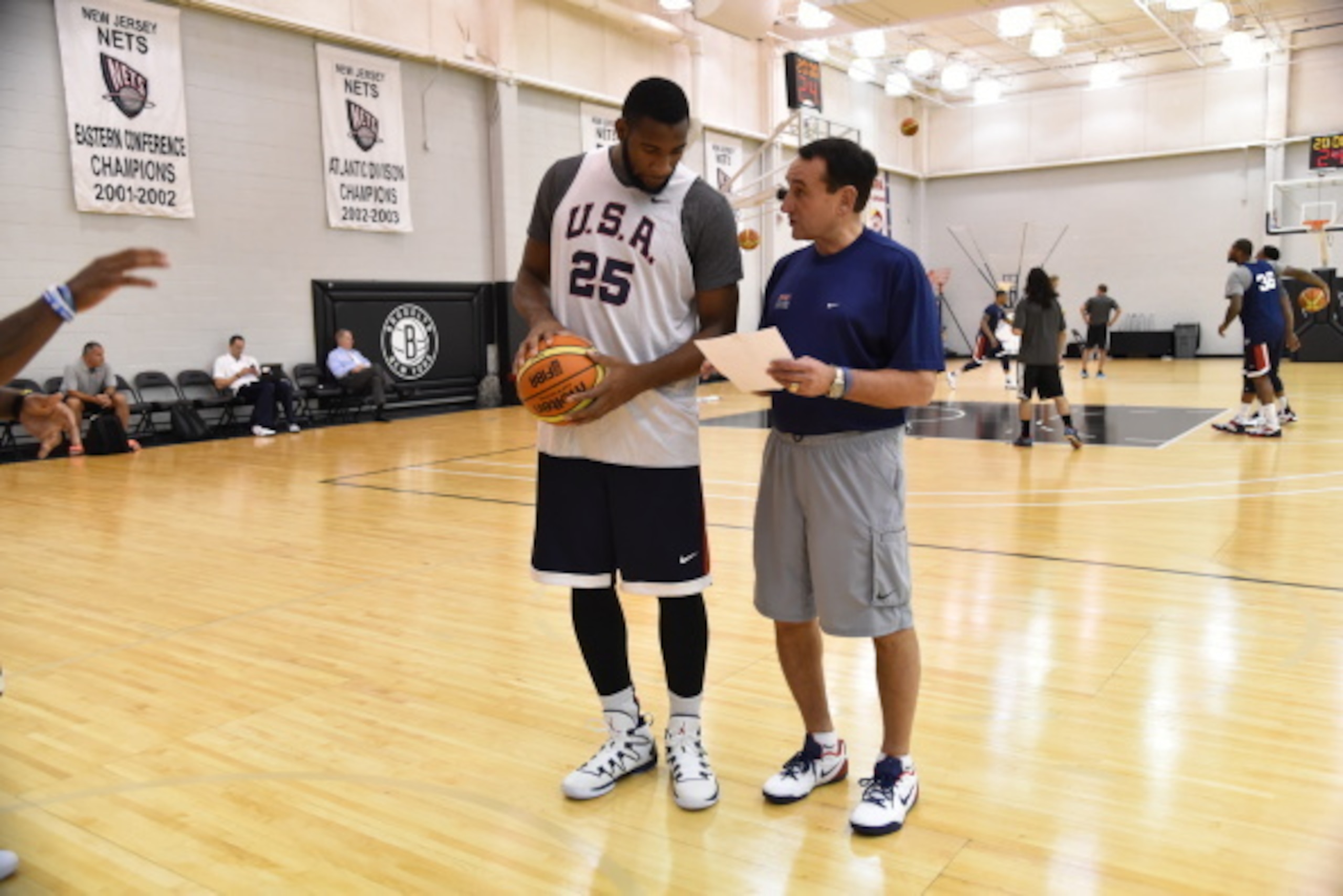 EAST RUTHERFORD, NJ - AUGUST 19: Andre Drummond and Mike Krzyzewski of the USA Basketball Men's National Team talk during practice at the PNY Center on August 19, 2014 in East Rutherford, New Jersey. NOTE TO USER: User expressly acknowledges and agrees th