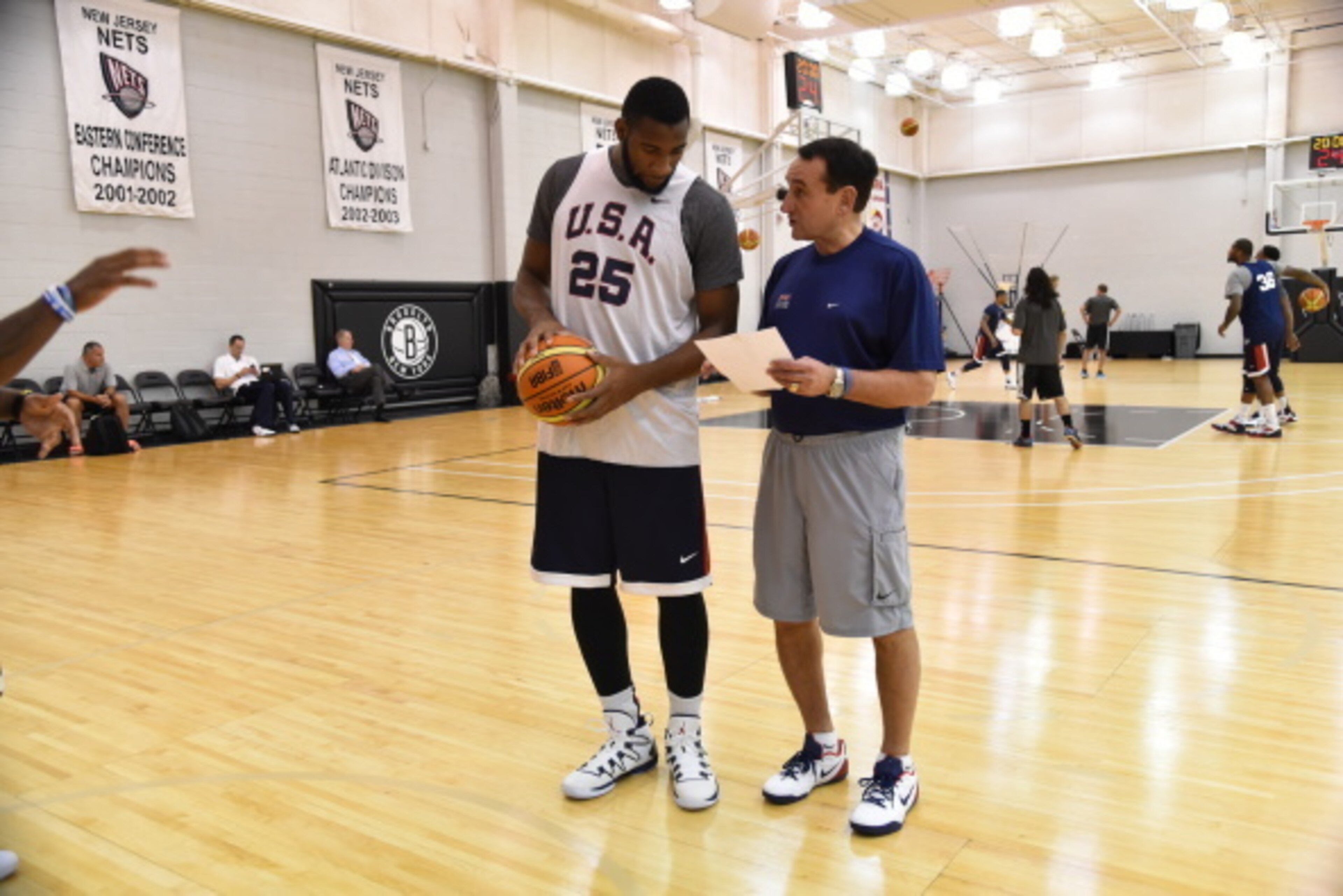 EAST RUTHERFORD, NJ - AUGUST 19: Andre Drummond and Mike Krzyzewski of the USA Basketball Men's National Team talk during practice at the PNY Center on August 19, 2014 in East Rutherford, New Jersey. NOTE TO USER: User expressly acknowledges and agrees th