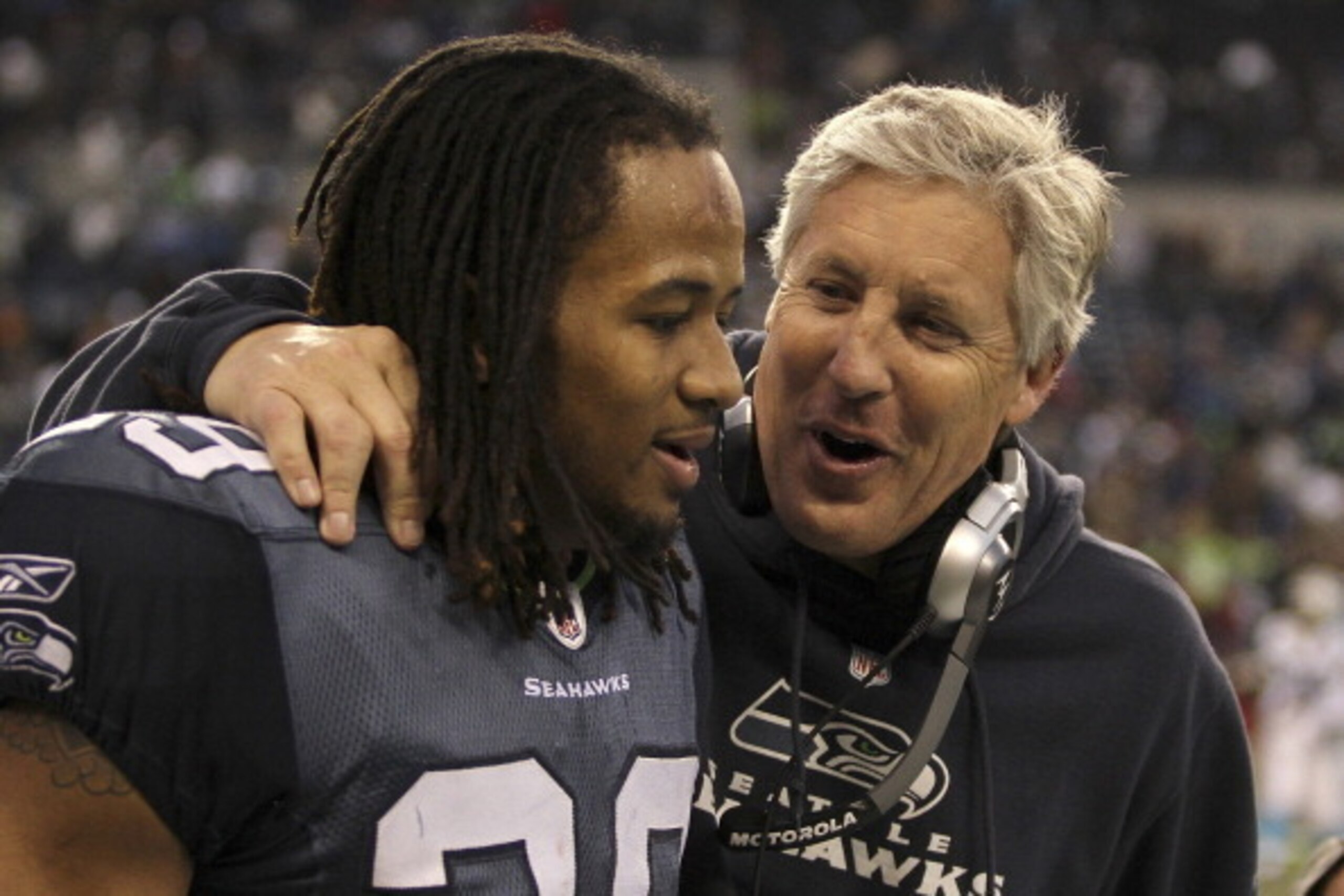 SEATTLE, WA - DECEMBER 05:  Head coach Pete Carroll of the Seattle Seahawks congratulates free safety Earl Thomas #29 near the end of the game against the Carolina Panthers at Qwest Field on December 5, 2010 in Seattle, Washington. The Seahawks defeated t