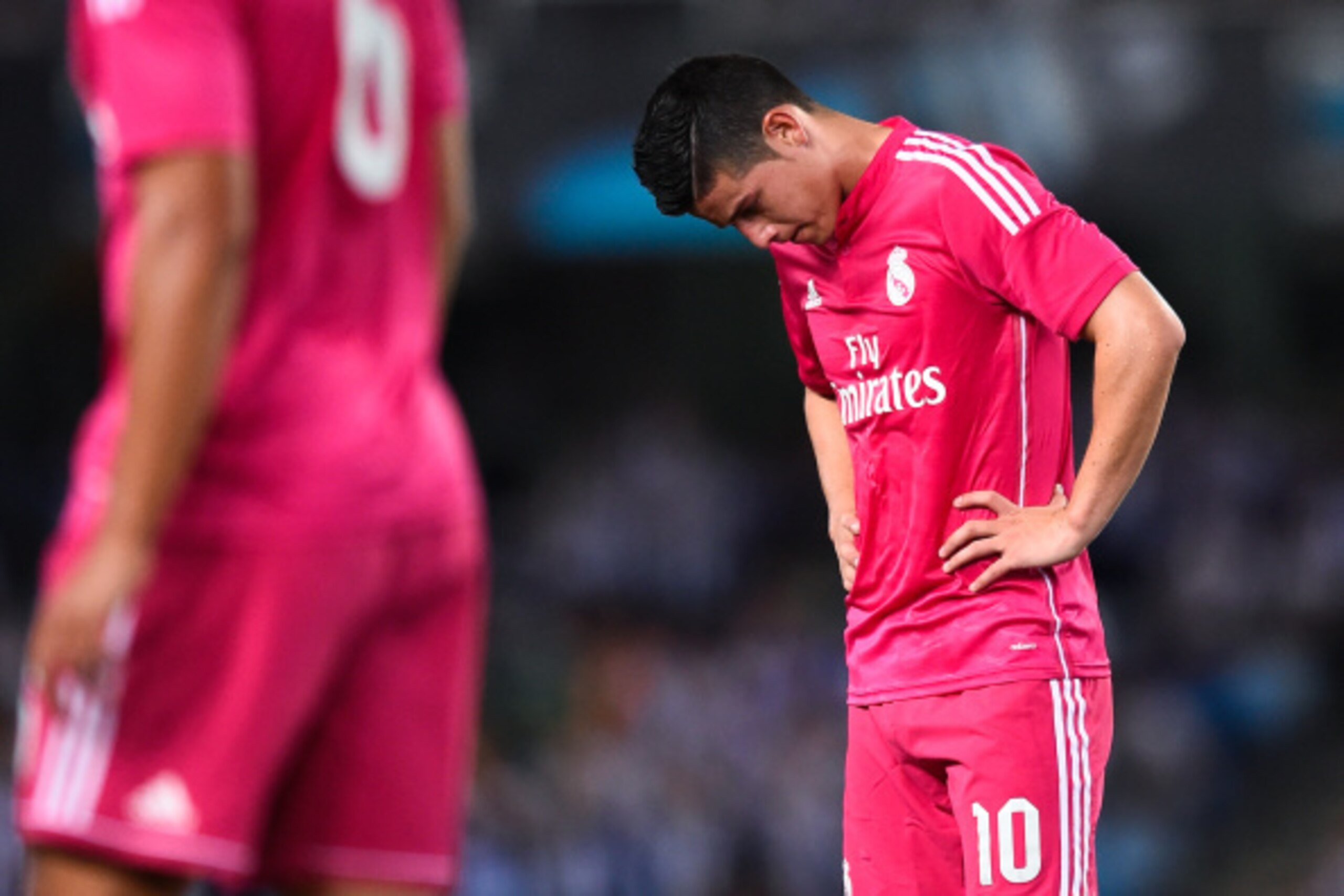 SAN SEBASTIAN, SPAIN - AUGUST 31:  James Rodriguez of Real Madrid CF reacts during the La Liga match between Real Sociedad de Futbol and Real Madrid CF at Estadio Anoeta on August 31, 2014 in San Sebastian, Spain.  (Photo by David Ramos/Getty Images)