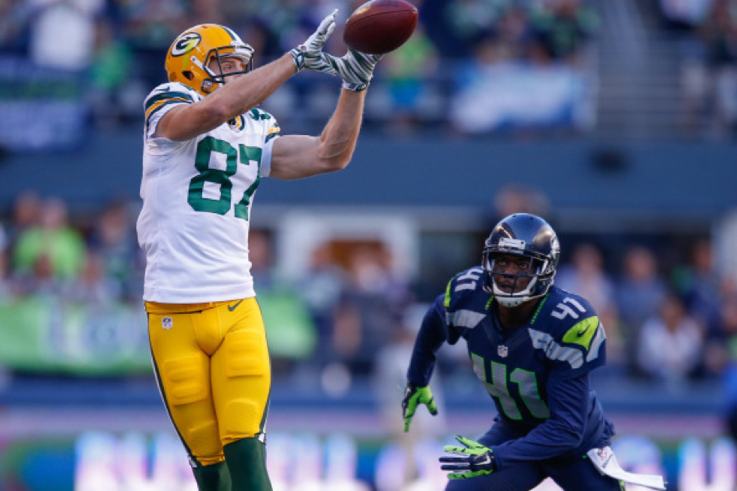 SEATTLE, WA - SEPTEMBER 04:  Wide receiver Jordy Nelson #87 of the Green Bay Packers makes a catch against defensive back Byron Maxwell #41 of the Seattle Seahawks at CenturyLink Field on September 4, 2014 in Seattle, Washington. The Seahawks defeated the