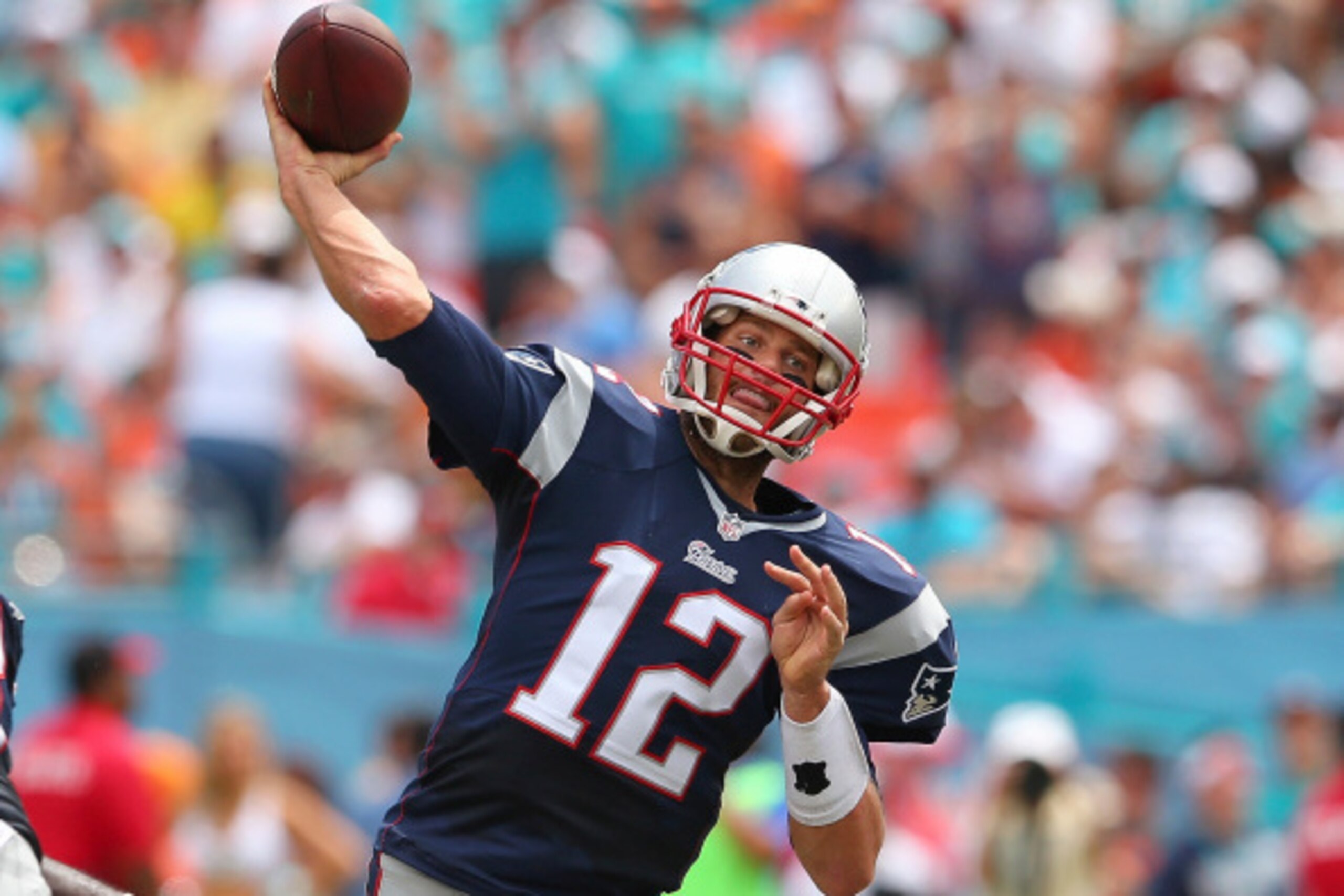 MIAMI GARDENS, FL - SEPTEMBER 07: Tom Brady #12 of the New England Patriots throws in the second quarter against the Miami Dolphins during a game at Sun Life Stadium on September 7, 2014 in Miami Gardens, Florida. (Photo by Mike Ehrmann/Getty Images) MIAMI GARDENS, FL - SEPTEMBER 07: Tom Brady #12 of the New England Patriots throws in the second quarter against the Miami Dolphins during a game at Sun Life Stadium on September 7, 2014 in Miami Gardens, Florida. (Photo by Mike Ehrmann/Getty Images)