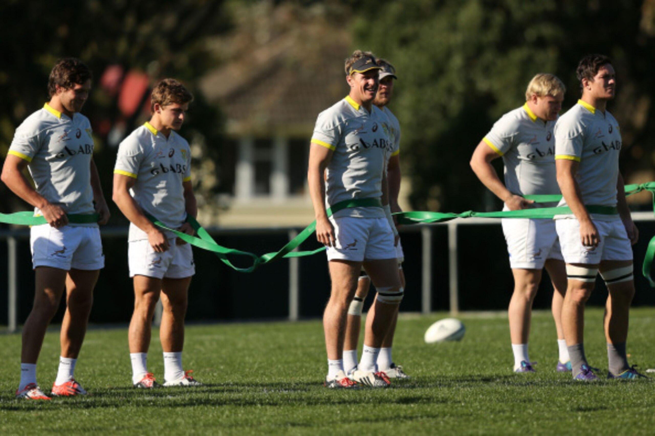 WELLINGTON, NEW ZEALAND - SEPTEMBER 09:  Captain Jean de Villiers (centre) enjoys a laugh during a South Africa Springboks training session at Porirua Park on September 9, 2014 in Wellington, New Zealand.  (Photo by Hagen Hopkins/Getty Images)