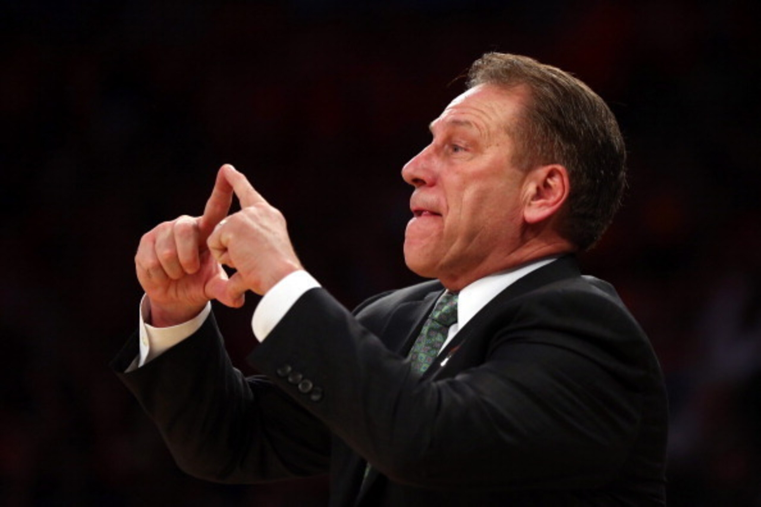 NEW YORK, NY - MARCH 28:  Head coach Tom Izzo of the Michigan State Spartans gestures from the bench against the Virginia Cavaliers during the regional semifinal of the 2014 NCAA Men's Basketball Tournament at Madison Square Garden on March 28, 2014 in Ne