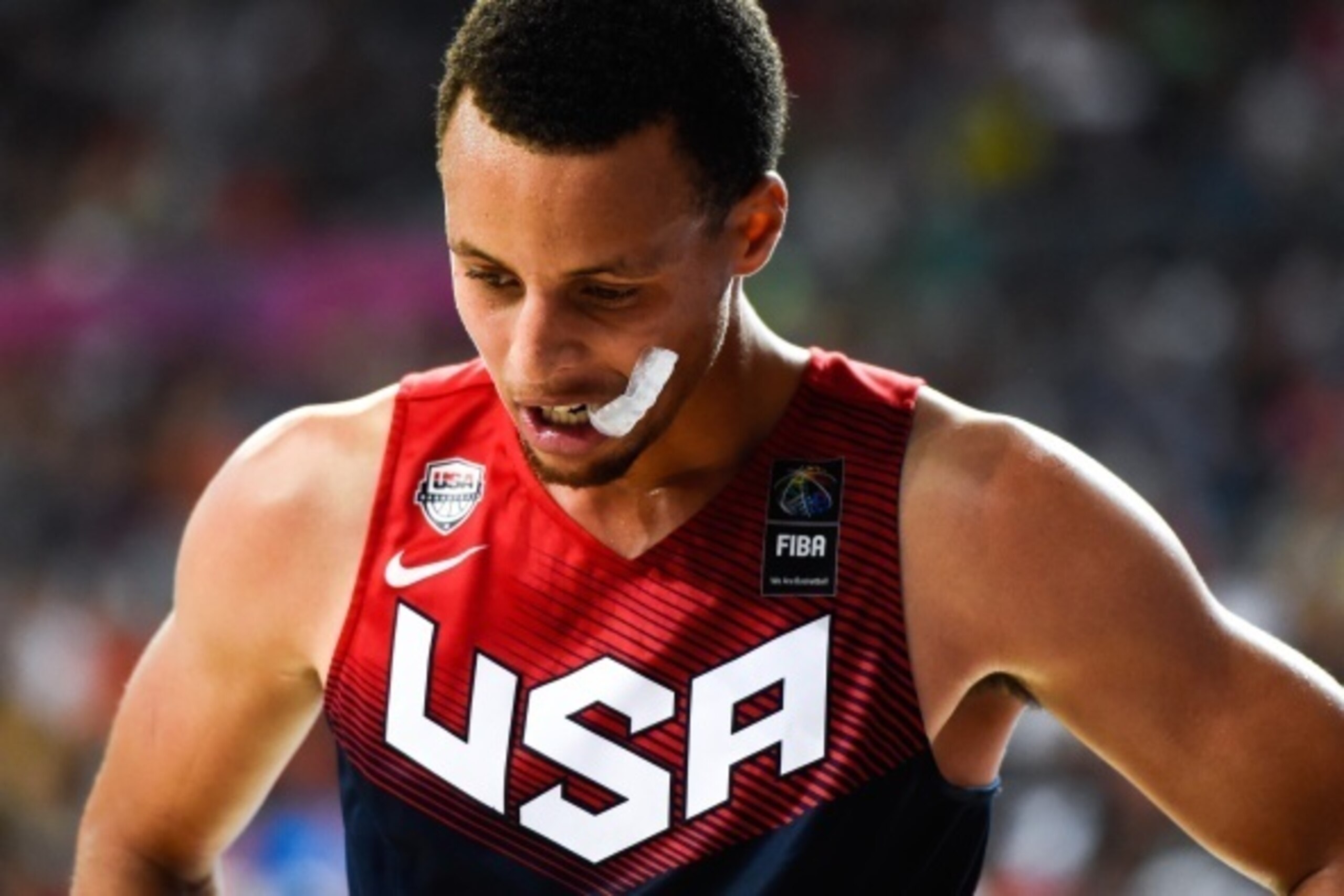 BARCELONA, SPAIN - SEPTEMBER 09:  Stephen Curry #4 of the USA Basketball Men's National Team looks on during 2014 FIBA Basketball World Cup quarter-final match between Lithuania and Turkey at Palau Sant Jordi on September 9, 2014 in Barcelona, Spain.  (Ph