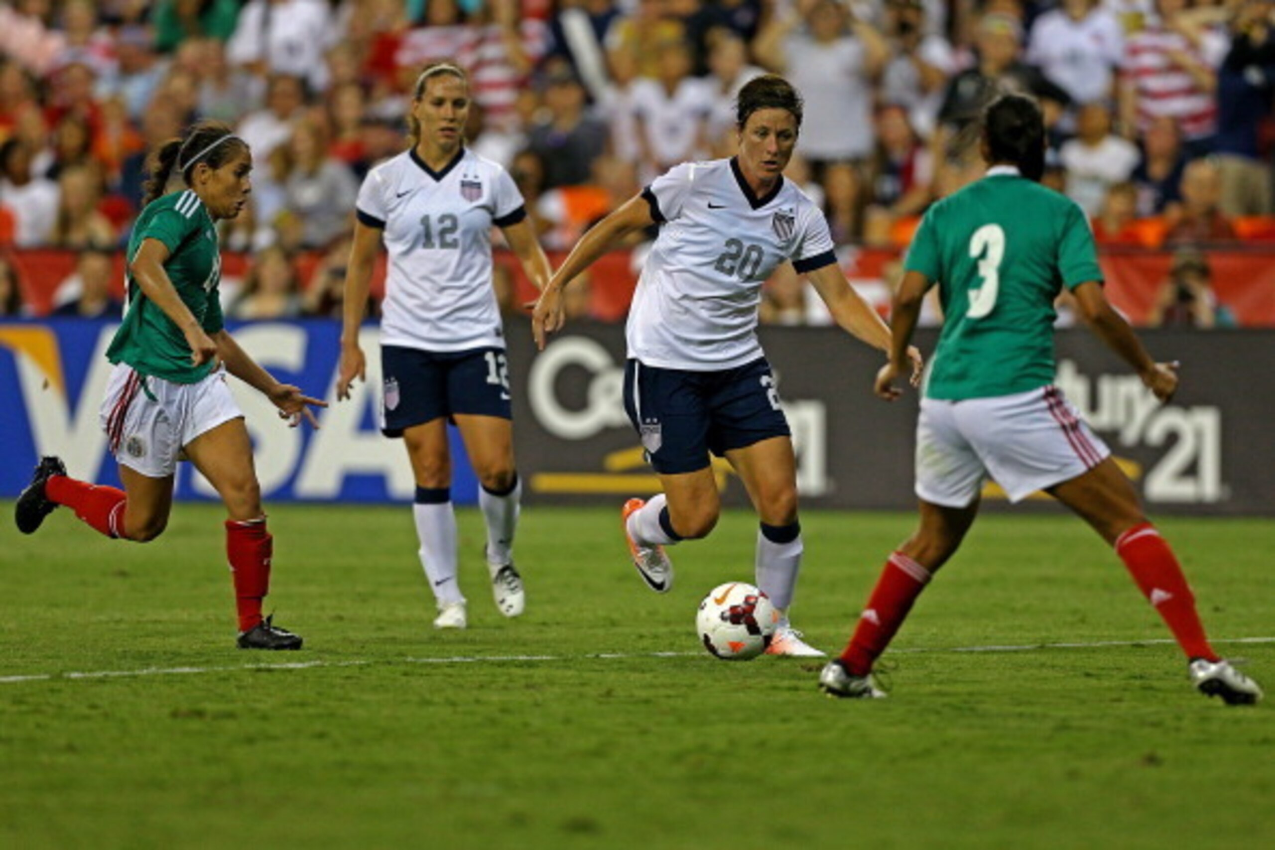WASHINGTON, DC - SEPTEMBER 03: Forward Abby Wambach #20 of USA in action against Mexico during an International Friendly at RFK Stadium on September 3, 2013 in Washington, DC.  The United Stated defeated Mexico 7-0. (Photo by Patrick Smith/Getty Images)