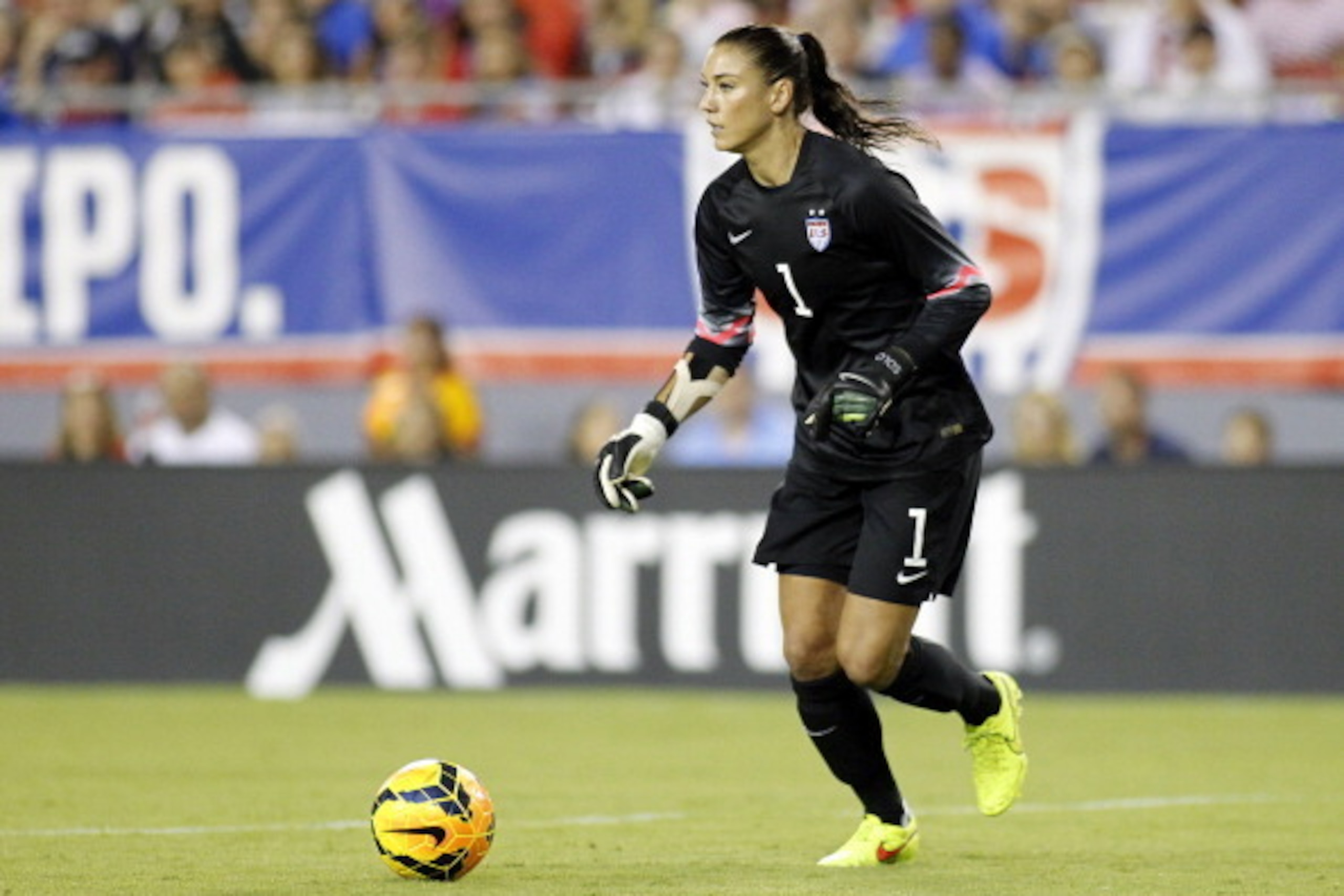 TAMPA, FL - JUNE 14:  Goalkeeper Hope Solo #1 of the United States controls the ball during the second half of a women's friendly soccer match against France on June 14, 2014 at Raymond James Stadium in Tampa, Florida.  (Photo by Brian Blanco/Getty Images