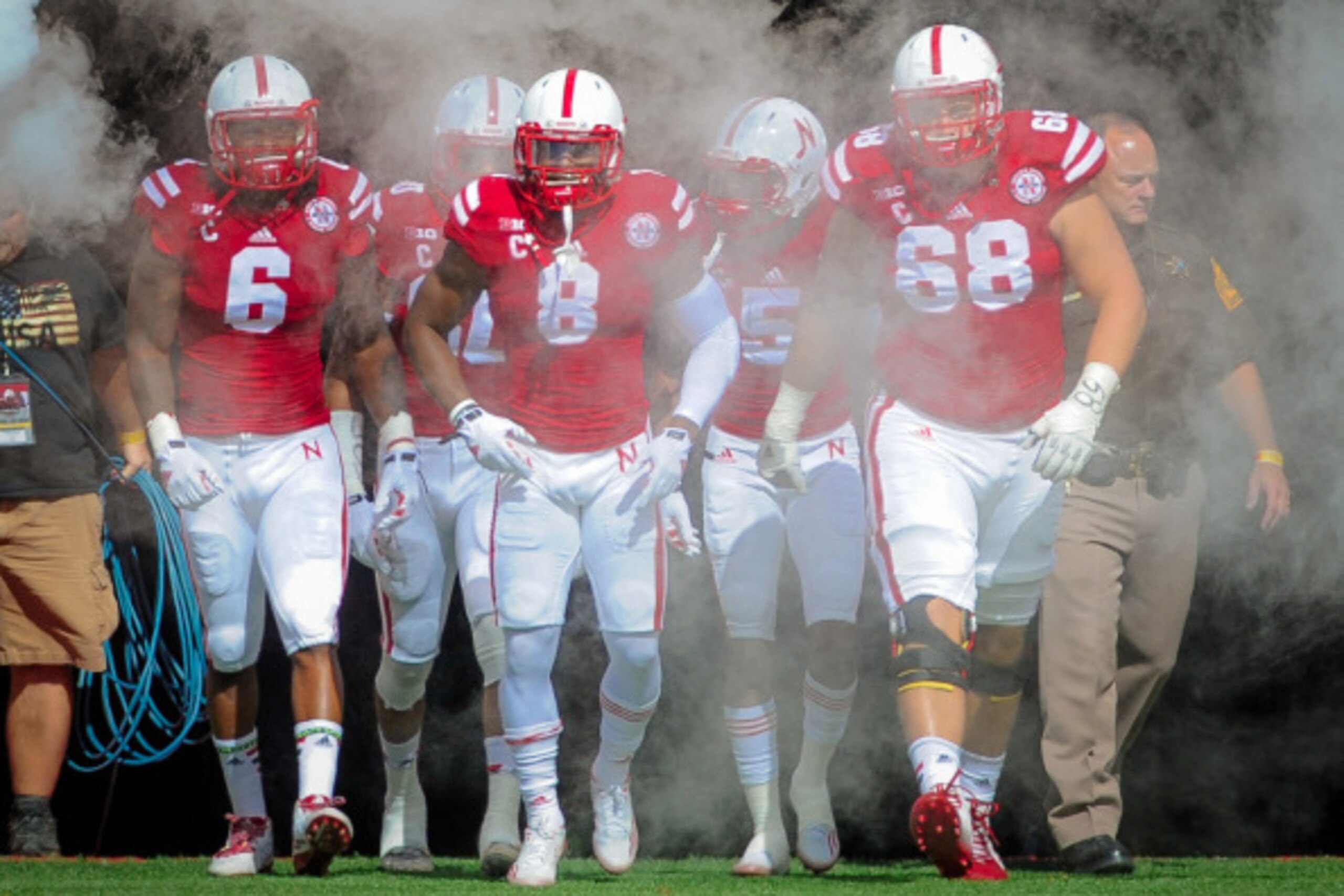 LINCOLN, NE - SEPTEMPER 6: Nebraska Cornhuskers captains take the field before their game against the McNeese State Cowboys at Memorial Stadium on September 6, 2014 in Lincoln, Nebraska. (Photo by Eric Francis/Getty Images)