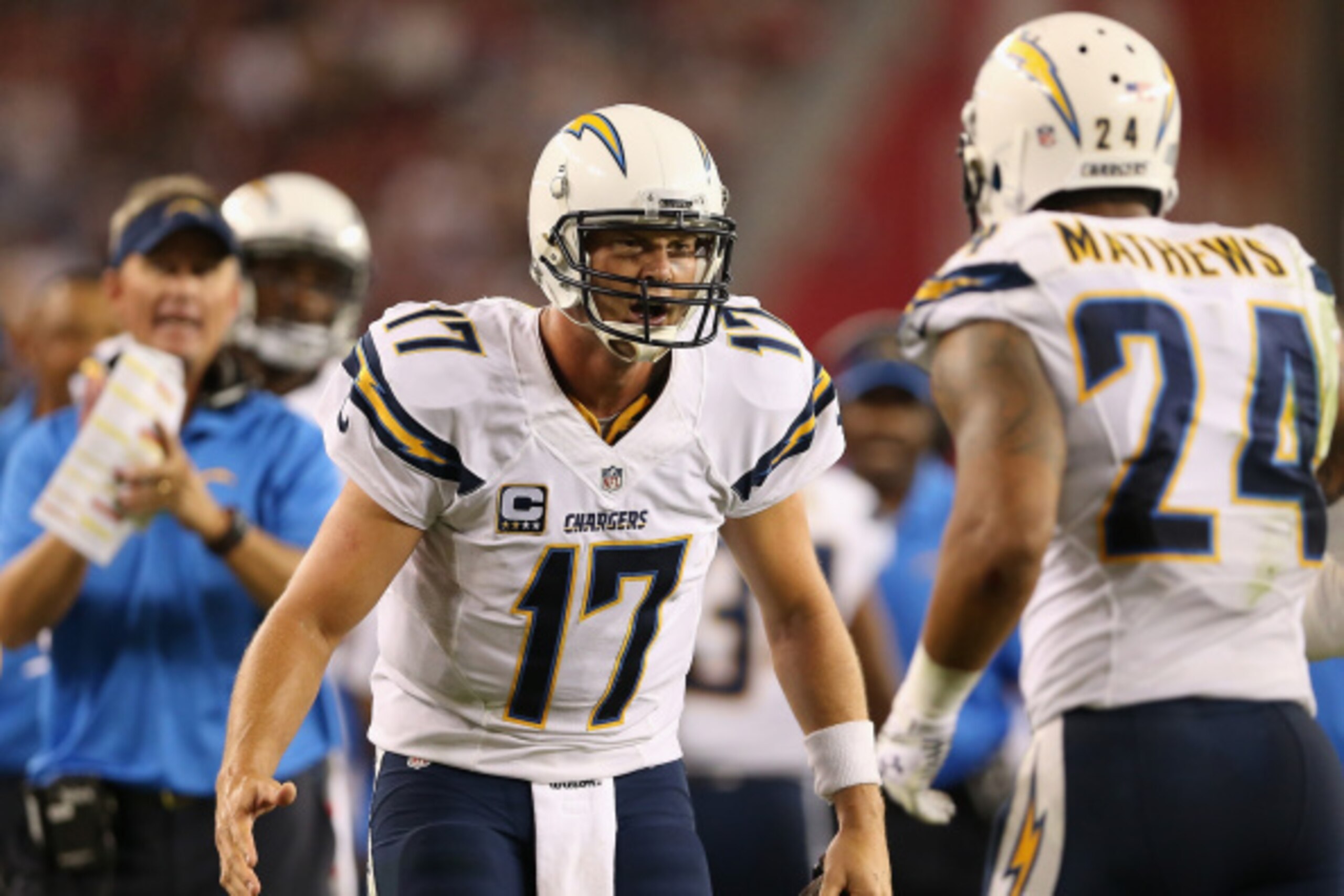 GLENDALE, AZ - SEPTEMBER 08:  Quarterback Philip Rivers #17 of the San Diego Chargers reacts with teammate Ryan Mathews #24 after Mathews scored a touchdown in the third quarter against the  Arizona Cardinals of the NFL game at the University of Phoenix S