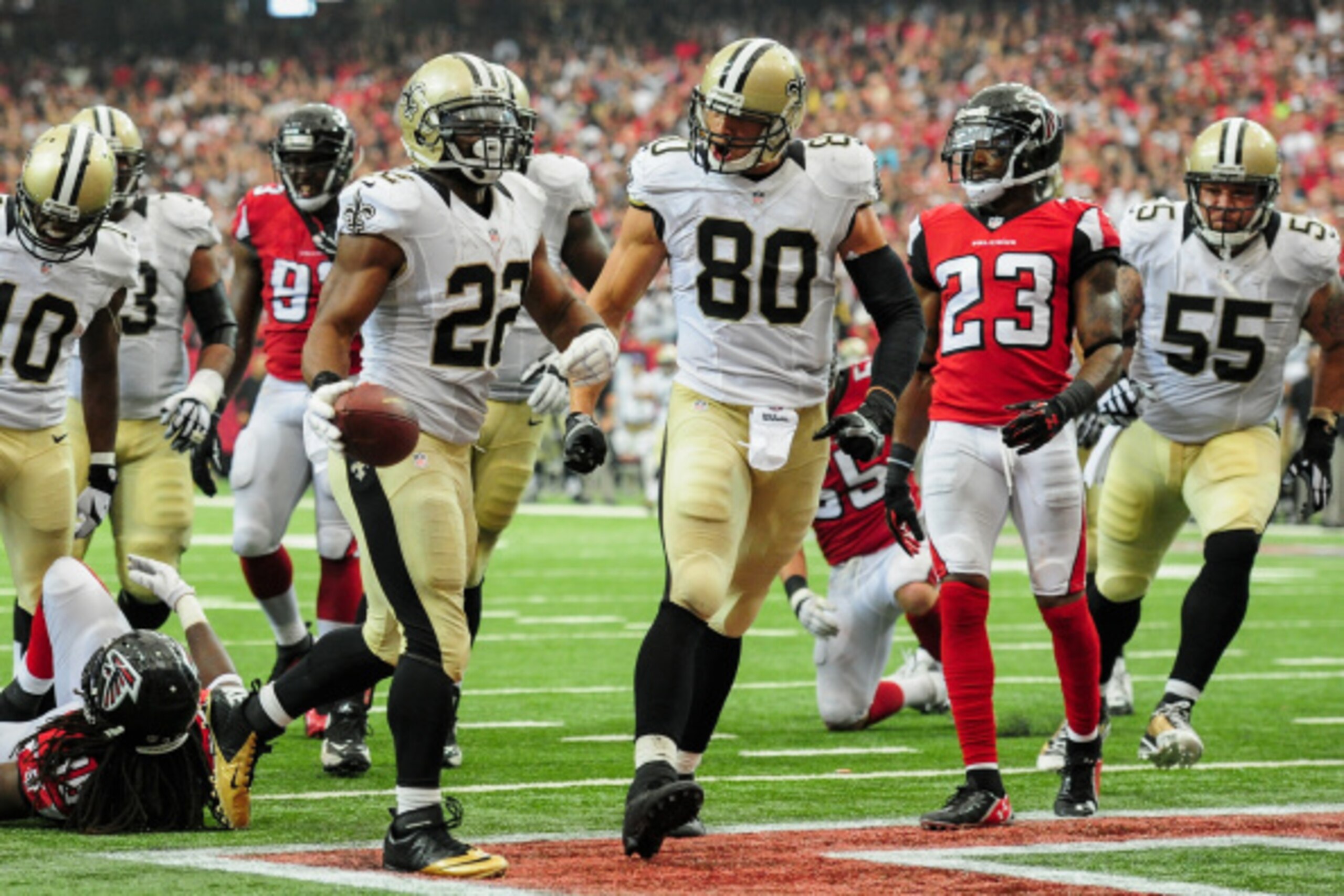 ATLANTA, GA - SEPTEMBER 07: Mark Ingram #22 celebrates a touchdown with Jimmy Graham #80 of the New Orleans Saints in the second half against the Atlanta Falcons at the Georgia Dome on September 7, 2014 in Atlanta, Georgia. The Falcons won 37-34. (Photo b