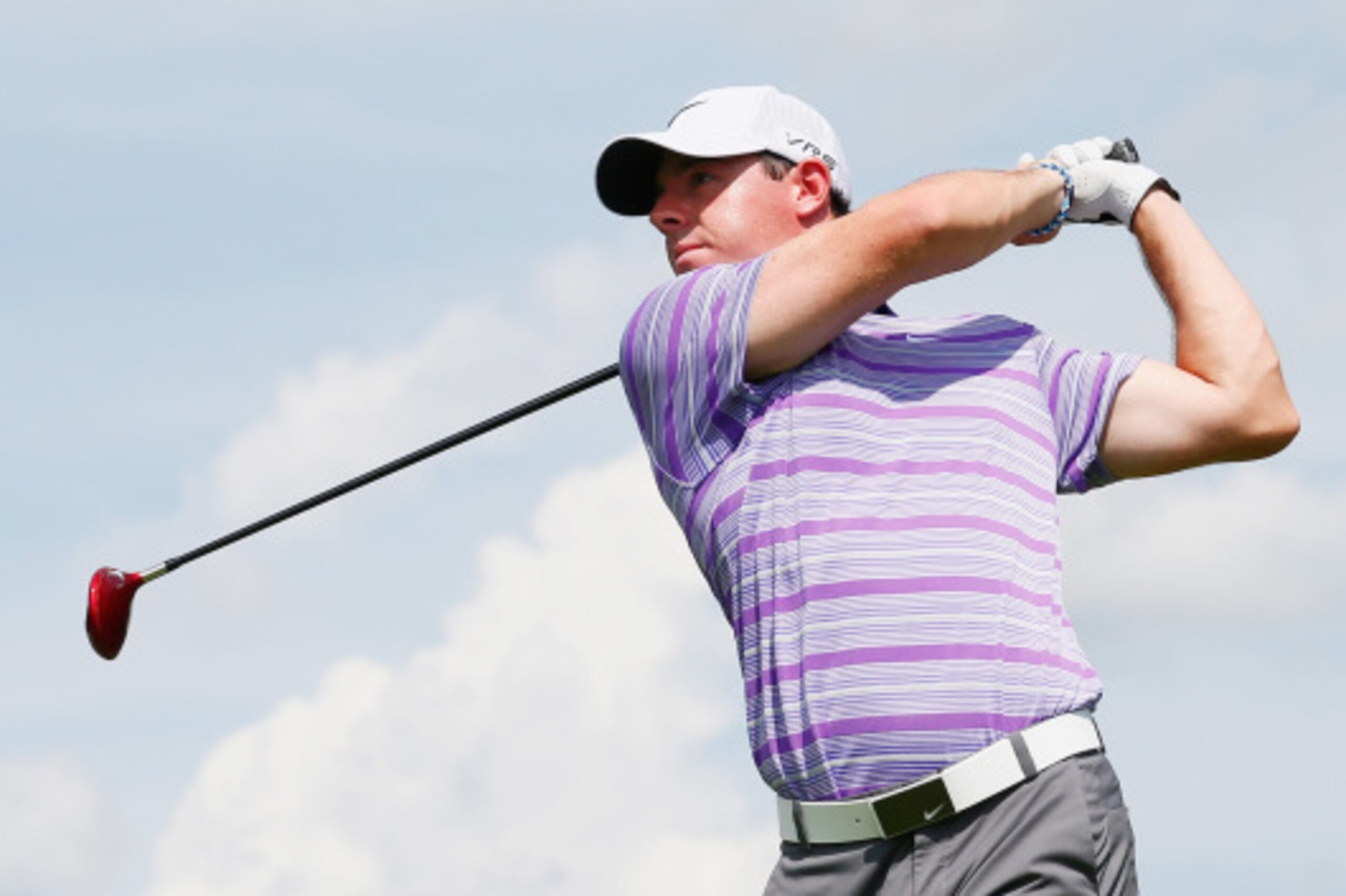 ATLANTA, GA - SEPTEMBER 11:  Rory McIlroy of Northern Ireland hits his tee shot on the seventh hole during the first round of the TOUR Championship by Coca-Cola at the East Lake Golf Club on September 11, 2014 in Atlanta, Georgia.  (Photo by Kevin C. Cox/