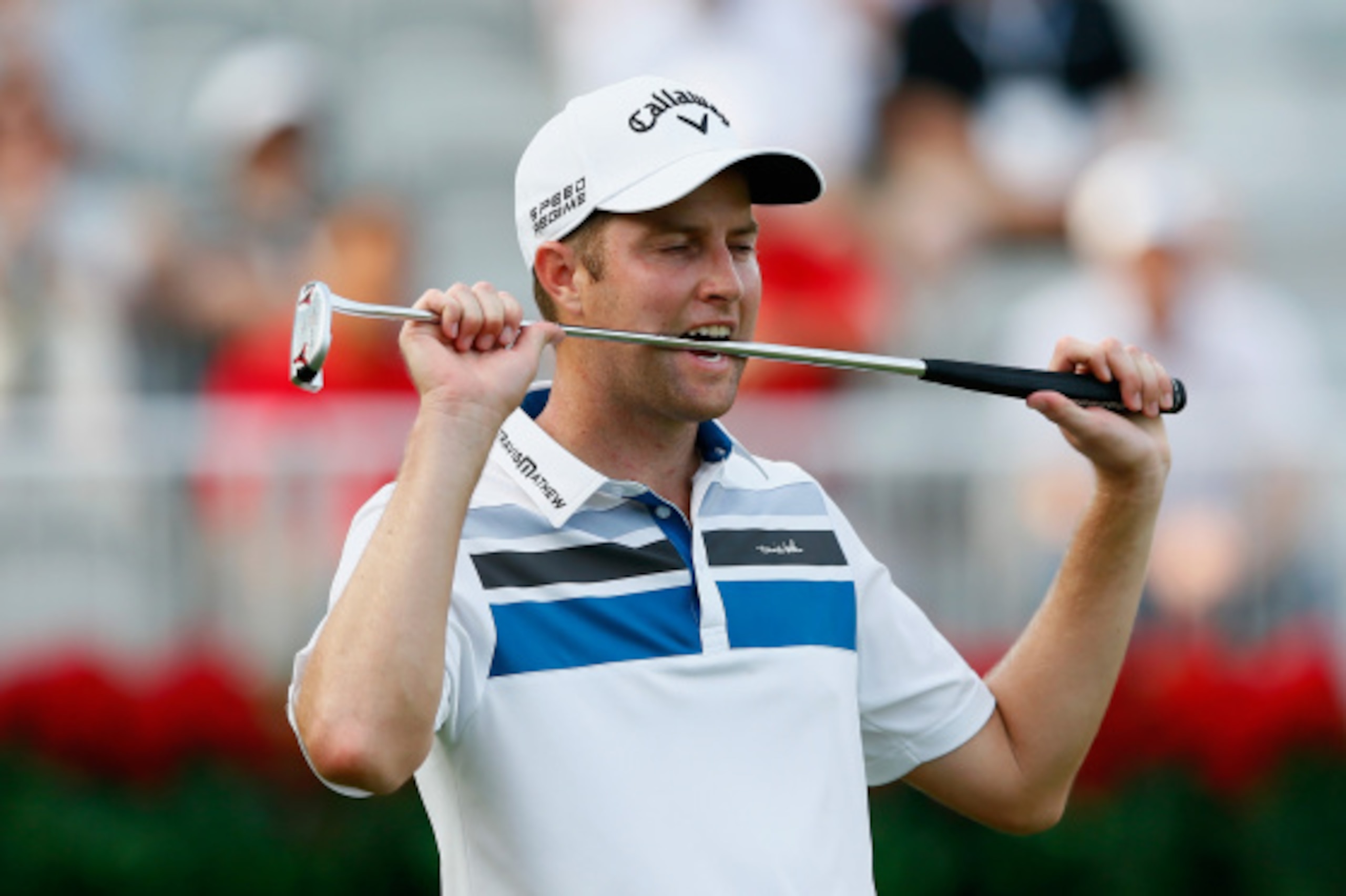 ATLANTA, GA - SEPTEMBER 11:  Chris Kirk of the United States reacts to a missed putt on the 18th green during the first round of the TOUR Championship by Coca-Cola at the East Lake Golf Club on September 11, 2014 in Atlanta, Georgia.  (Photo by Kevin C. C