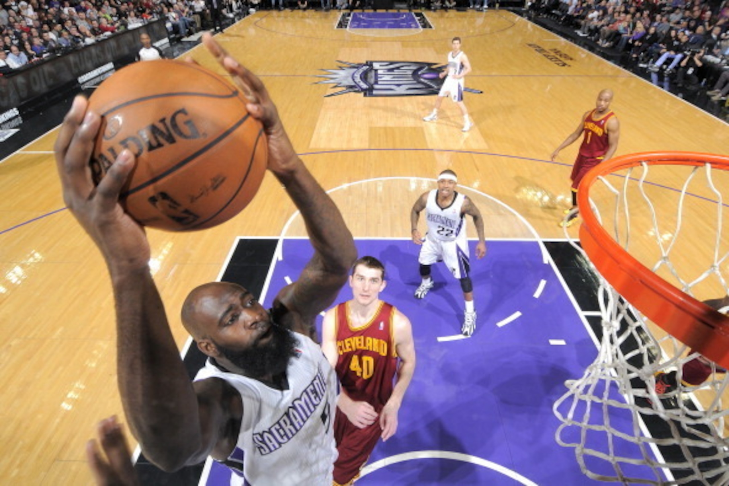 SACRAMENTO, CA - JANUARY 12: Quincy Acy #5 of the Sacramento Kings goes up for the shot against the Cleveland Cavaliers on January 12, 2014 at Sleep Train Arena in Sacramento, California. NOTE TO USER: User expressly acknowledges and agrees that, by downl