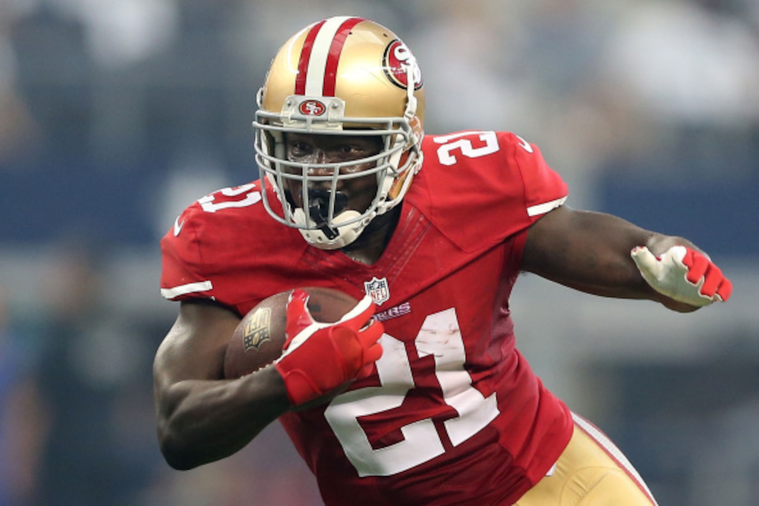 ARLINGTON, TX - SEPTEMBER 07: Frank Gore #21 of the San Francisco 49ers carries the ball against the Dallas Cowboys in the first half at AT&T Stadium on September 7, 2014 in Arlington, Texas. (Photo by Christian Petersen/Getty Images)