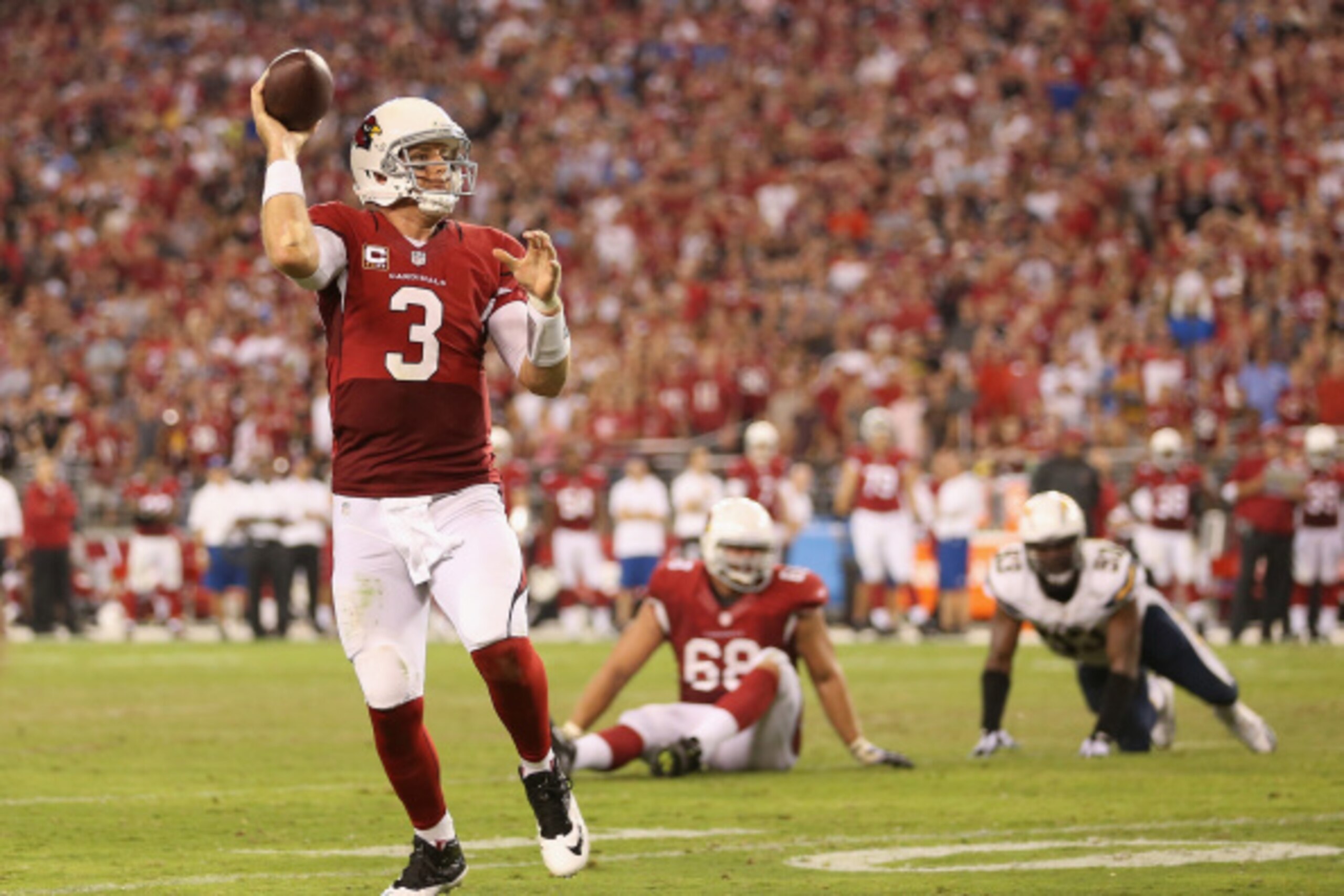GLENDALE, AZ - SEPTEMBER 08:  Quarterback Carson Palmer #3 of the Arizona Cardinals throws a pass during the NFL game against the San Diego Chargers at the University of Phoenix Stadium on September 8, 2014 in Glendale, Arizona.  The Cardinals defeated th