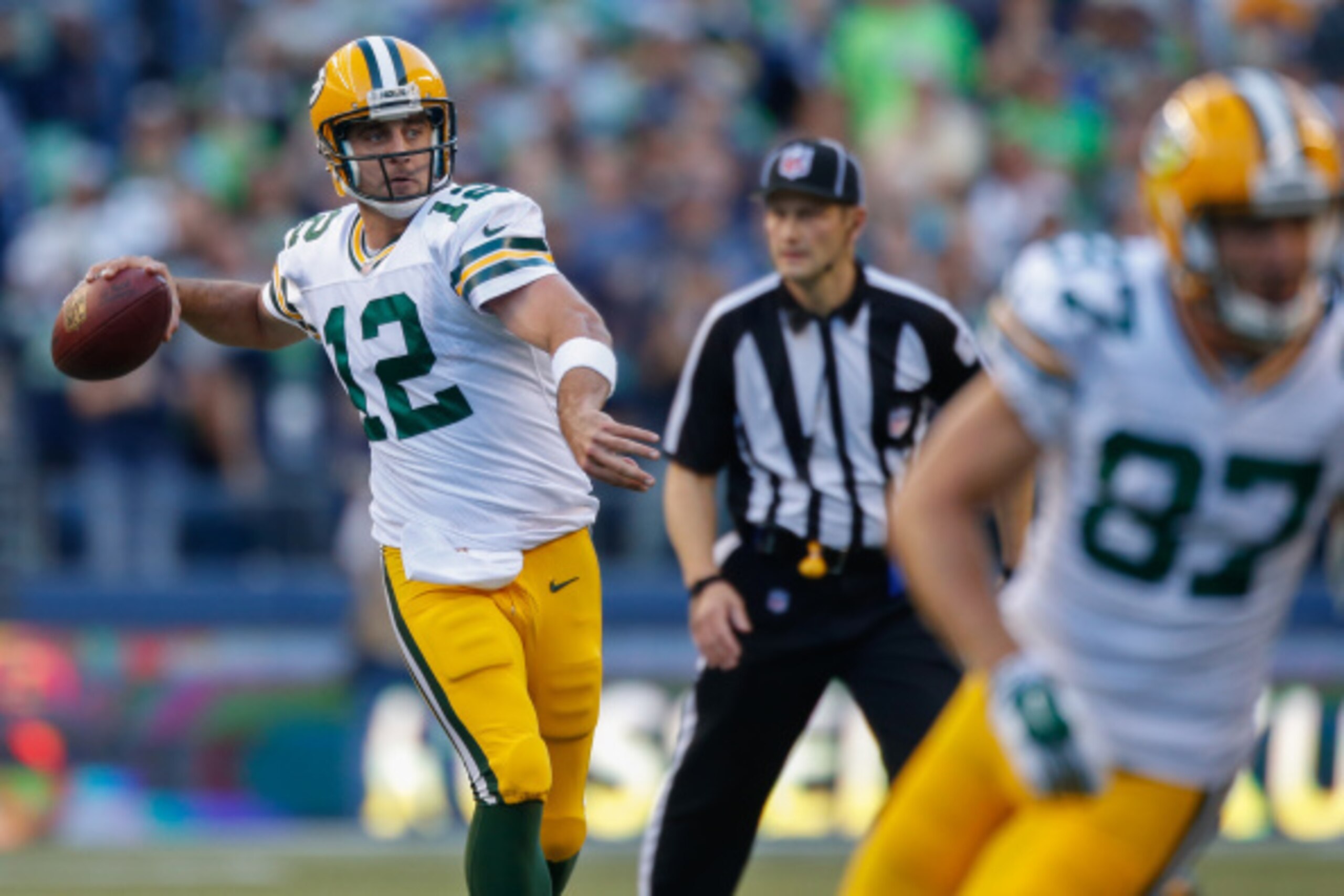 SEATTLE, WA - SEPTEMBER 04:  Quarterback Aaron Rodgers #12 of the Green Bay Packers passes against the Seattle Seahawks at CenturyLink Field on September 4, 2014 in Seattle, Washington.  (Photo by Otto Greule Jr/Getty Images)