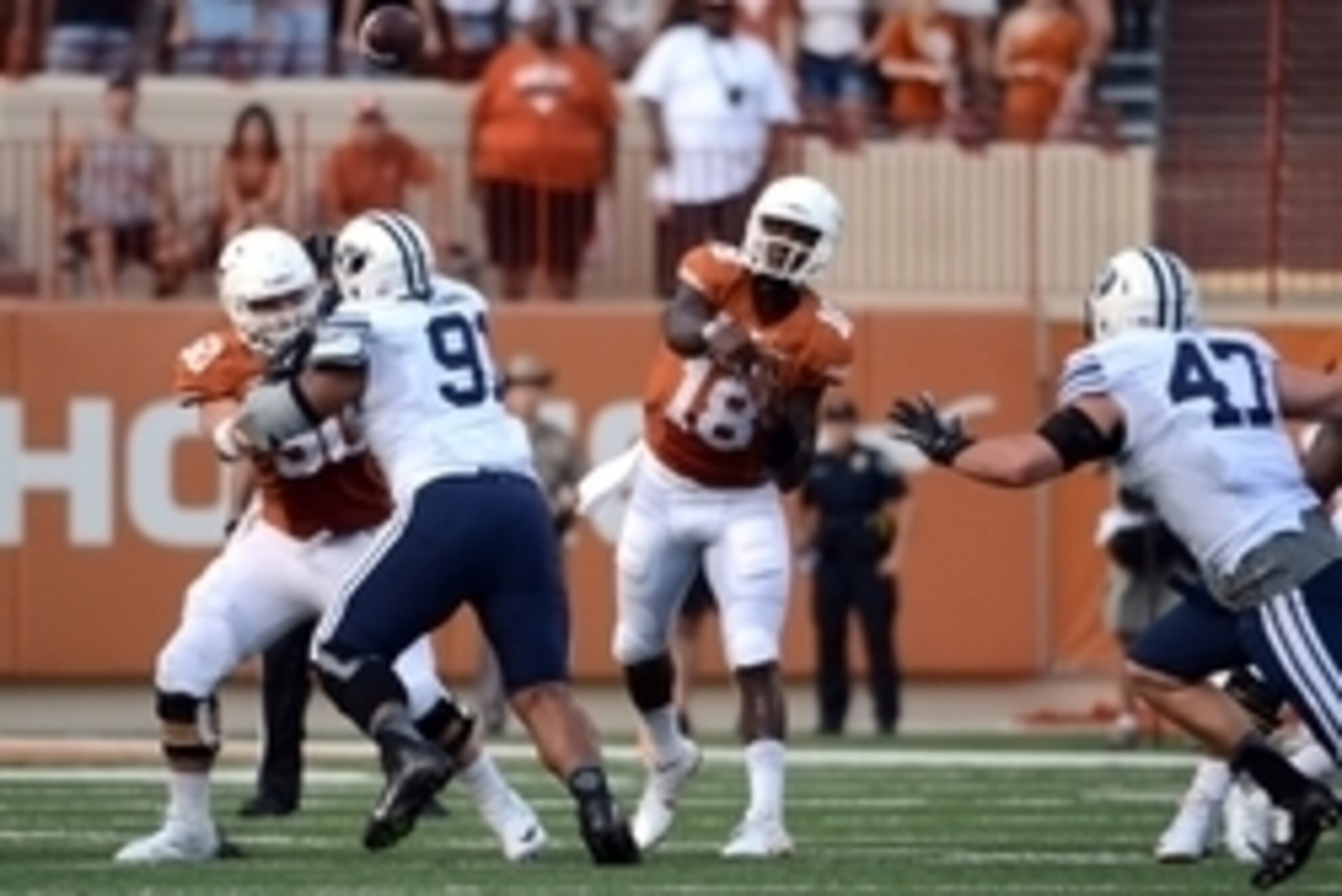 Sep 6, 2014; Austin, TX, USA; Texas Longhorns quarterback Tyrone Swoopes (18) passes the ball against the Brigham Young Cougars during the first half at Darrell K Royal-Texas Memorial Stadium. Mandatory Credit: Brendan Maloney-USA TODAY Sports