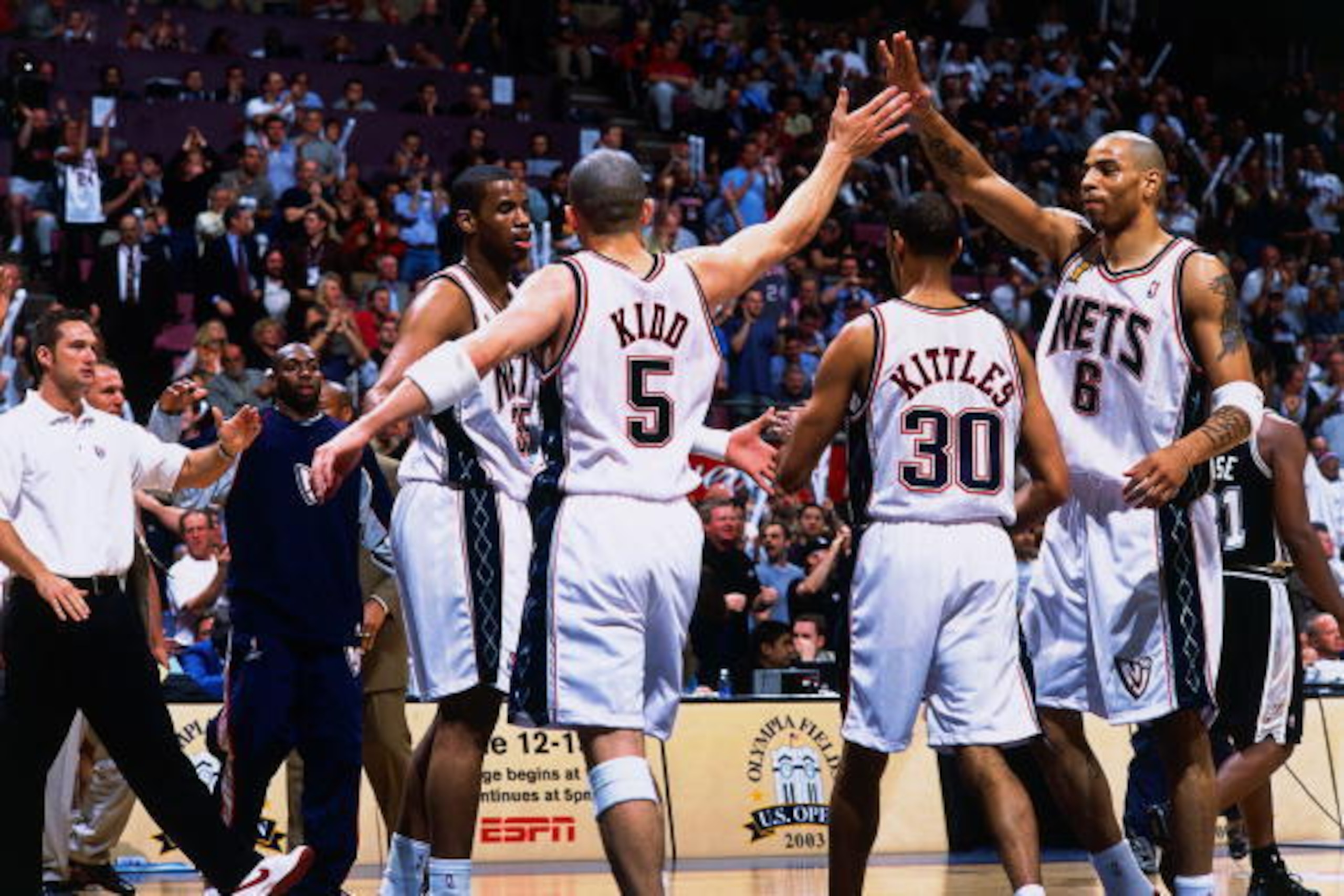 EAST RUTHERFORD, NJ - JUNE 8:  Kenyon Martin #6 and Jason Kidd #5 of the New Jersey Nets celebrate during Game three of the NBA Finals against the San Antonio Spurs at the Continental Airlines Arena on June 8, 2003 in East Rutherford, New Jersey.  The Spu