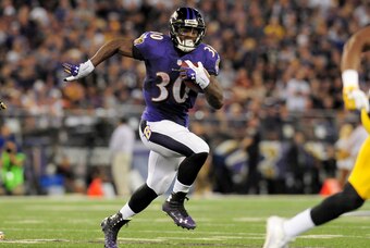 Sep 11, 2014; Baltimore, MD, USA; Baltimore Ravens running back Bernard Pierce (30) runs with the ball against the Pittsburgh Steelers at M&T Bank Stadium. Mandatory Credit: Evan Habeeb-USA TODAY Sports
