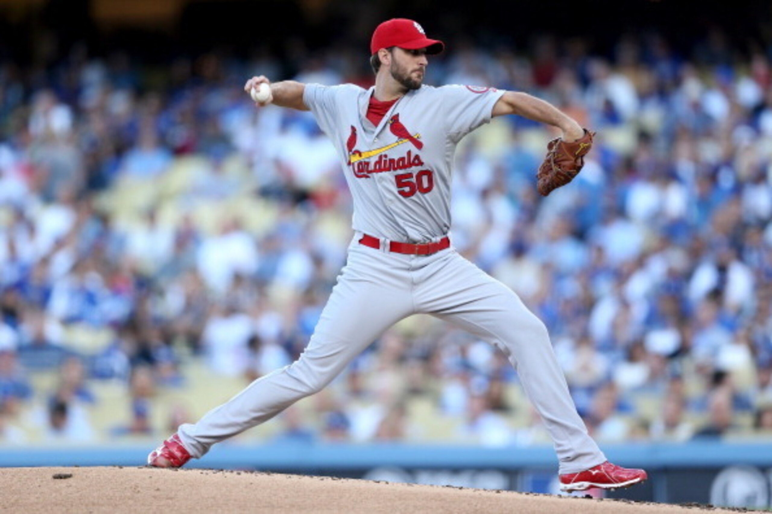 LOS ANGELES, CA - OCTOBER 14:  Adam Wainwright #50 of the St. Louis Cardinals pitches in the first inning against the Los Angeles Dodgers in Game Three of the National League Championship Series at Dodger Stadium on October 14, 2013 in Los Angeles, Califo