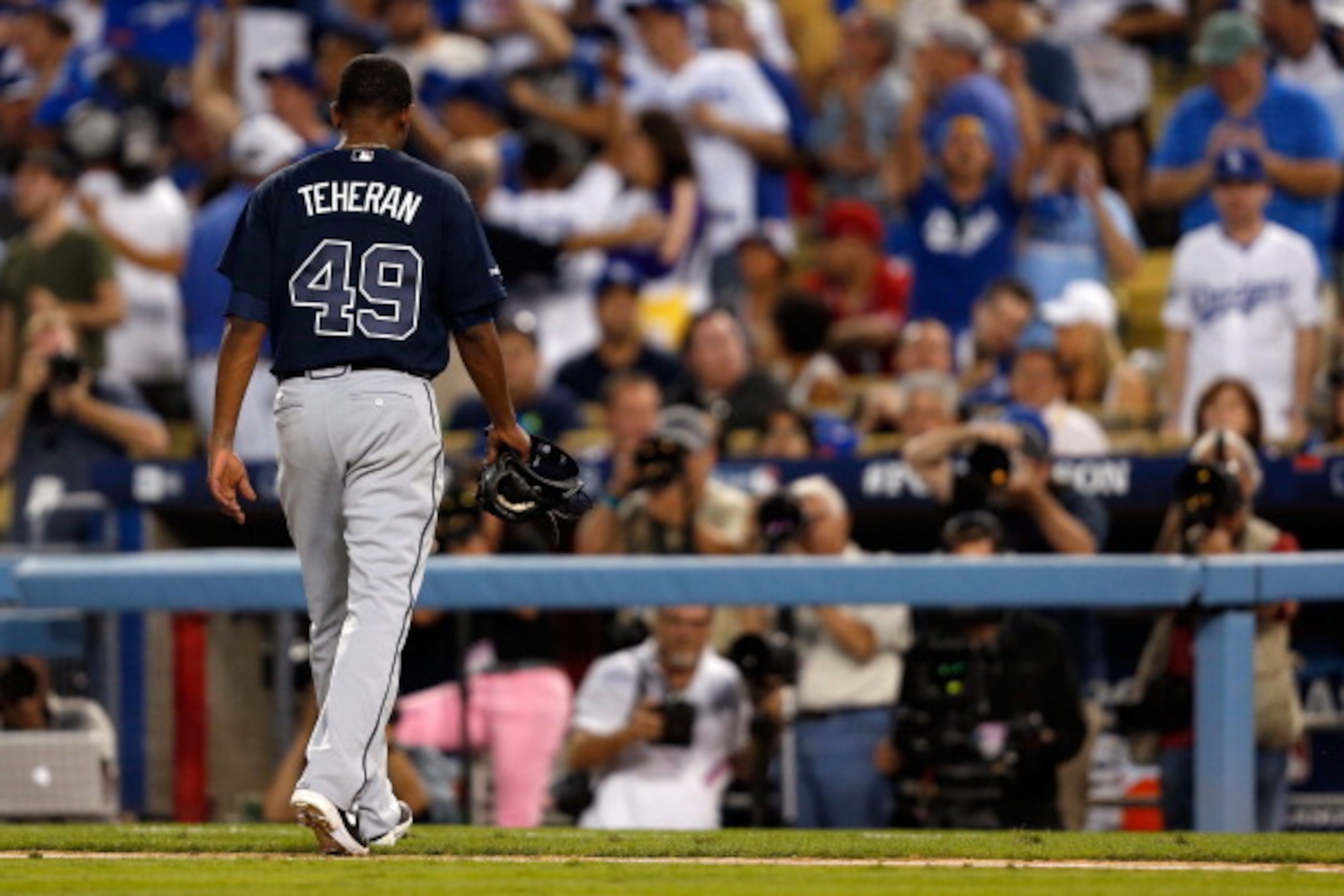 LOS ANGELES, CA - OCTOBER 06:  Julio Teheran #49 of the Atlanta Braves is pulled in the third inning against the Los Angeles Dodgers during Game Three of the National League Division Series at Dodger Stadium on October 6, 2013 in Los Angeles, California. 