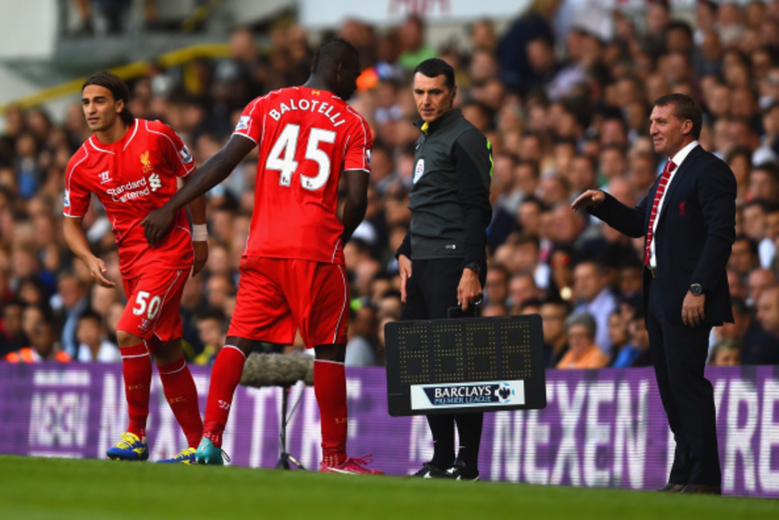 LONDON, ENGLAND - AUGUST 31:  Brendan Rodgers, manager of Liverpool looks on as Lazar Markovic of Liverpool replaces Mario Balotelli of Liverpool during the Barclays Premier League match between Tottenham Hotspur and Liverpool at White Hart Lane on August